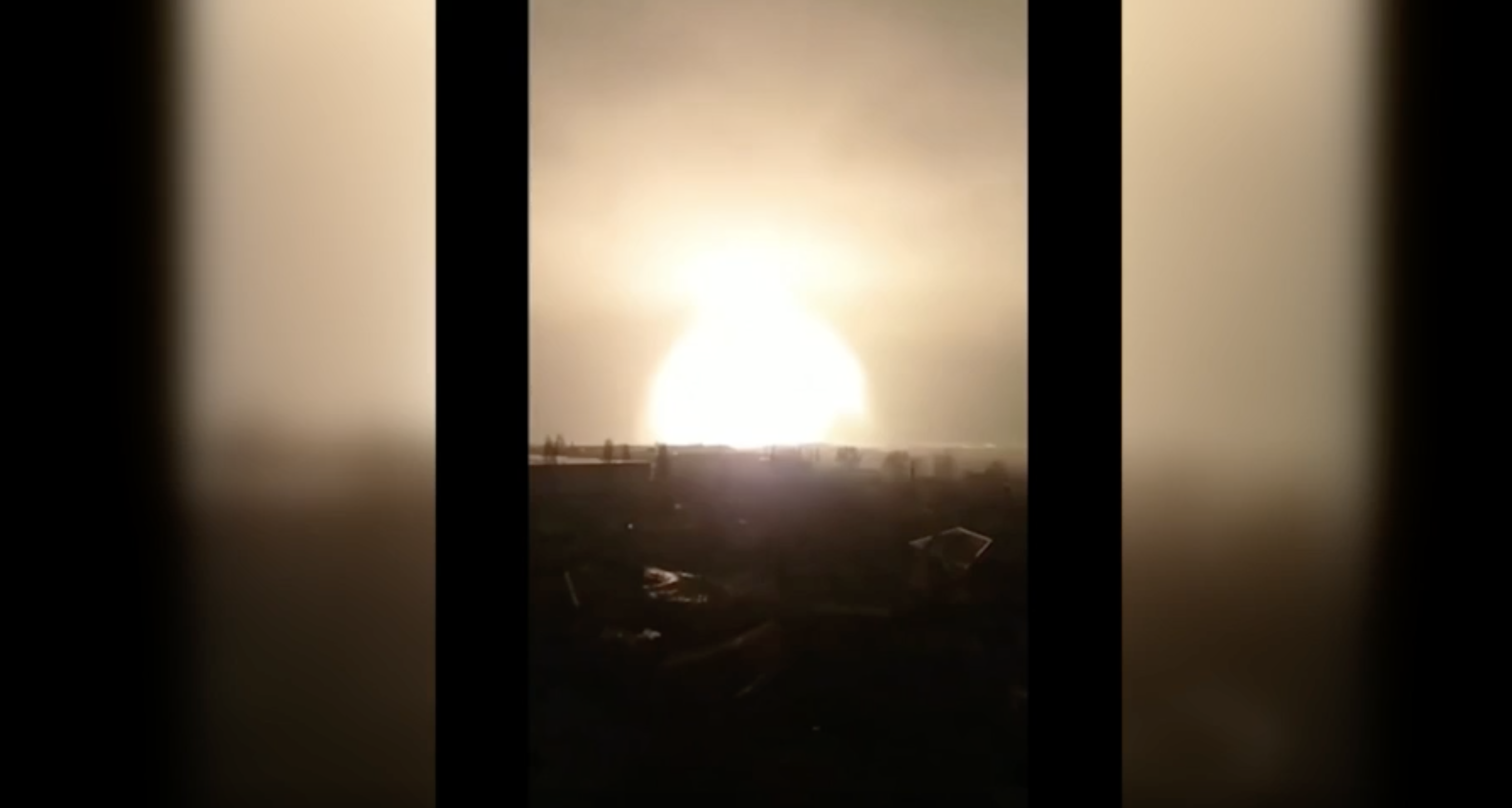 A grab from a video published by ТРУХА, a local Kharkiv news outlet, shows a massive explosion and shockwave seen from the upper floor of a residential building on March 2.