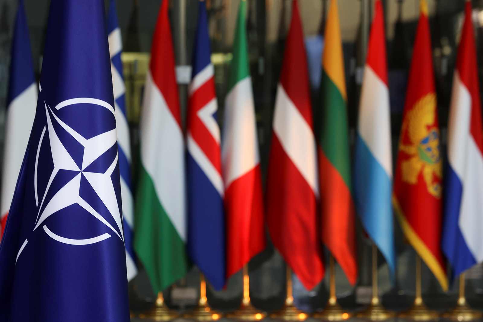 National flags of NATO members are seen at the alliance's headquarters in Brussels on March 4.