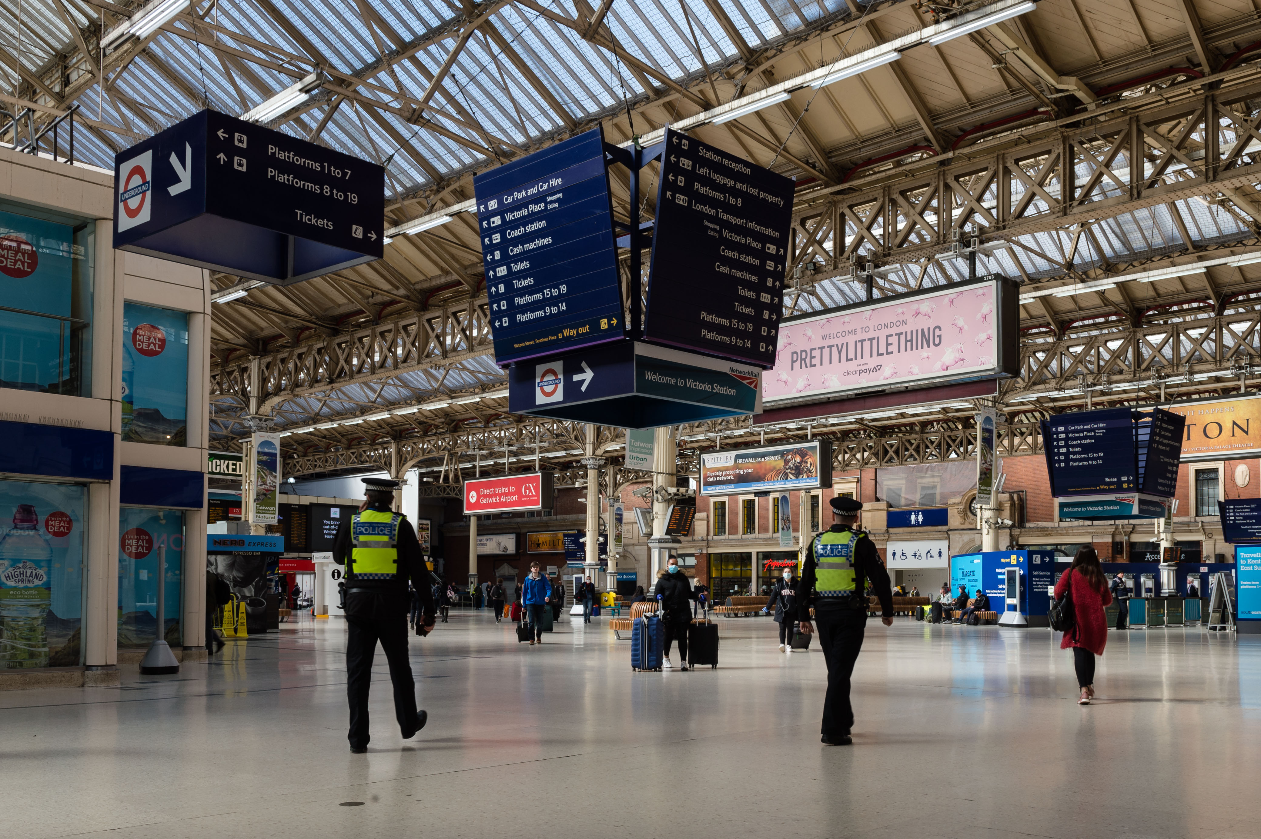 Police officers walk through Victoria station in central London on March 24.