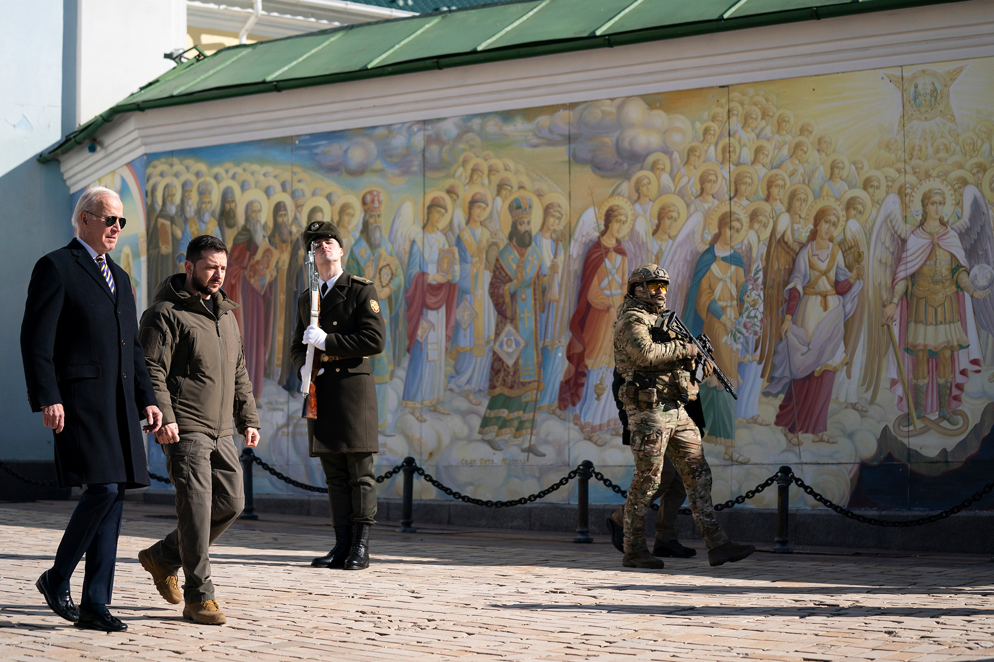 President Joe Biden walks with Ukrainian President Volodymyr Zelensky at St. Michael's Golden-Domed Cathedral on a surprise visit in Kyiv on Monday.