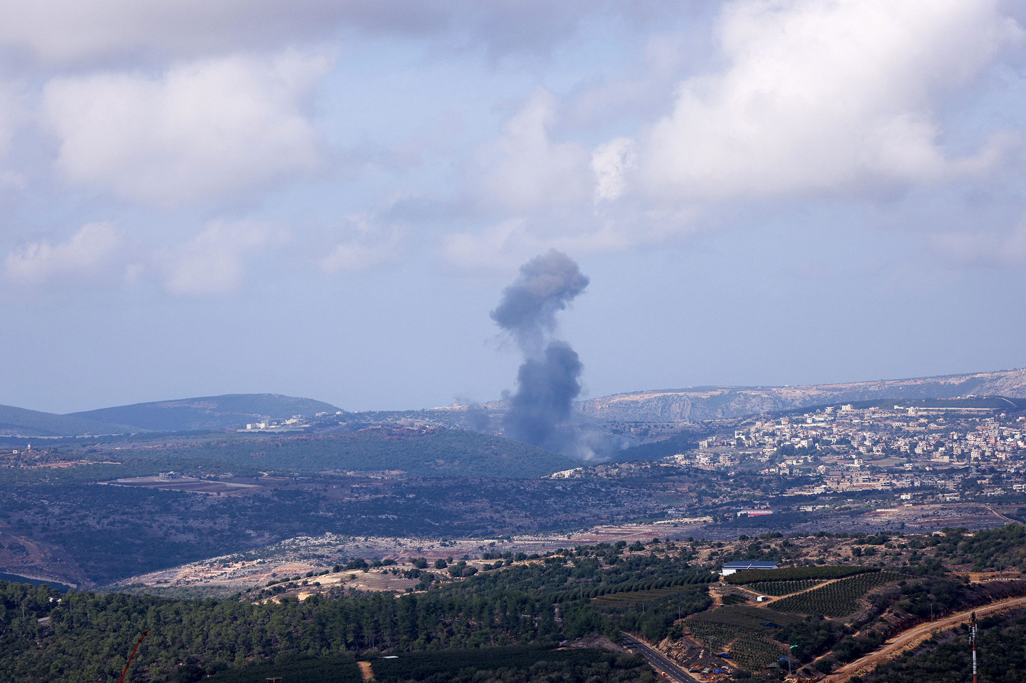 A picture taken from the Israeli side of border with Lebanon shows Israeli shelling near the southern Lebanese village of Aita Al Shaab on November 14.