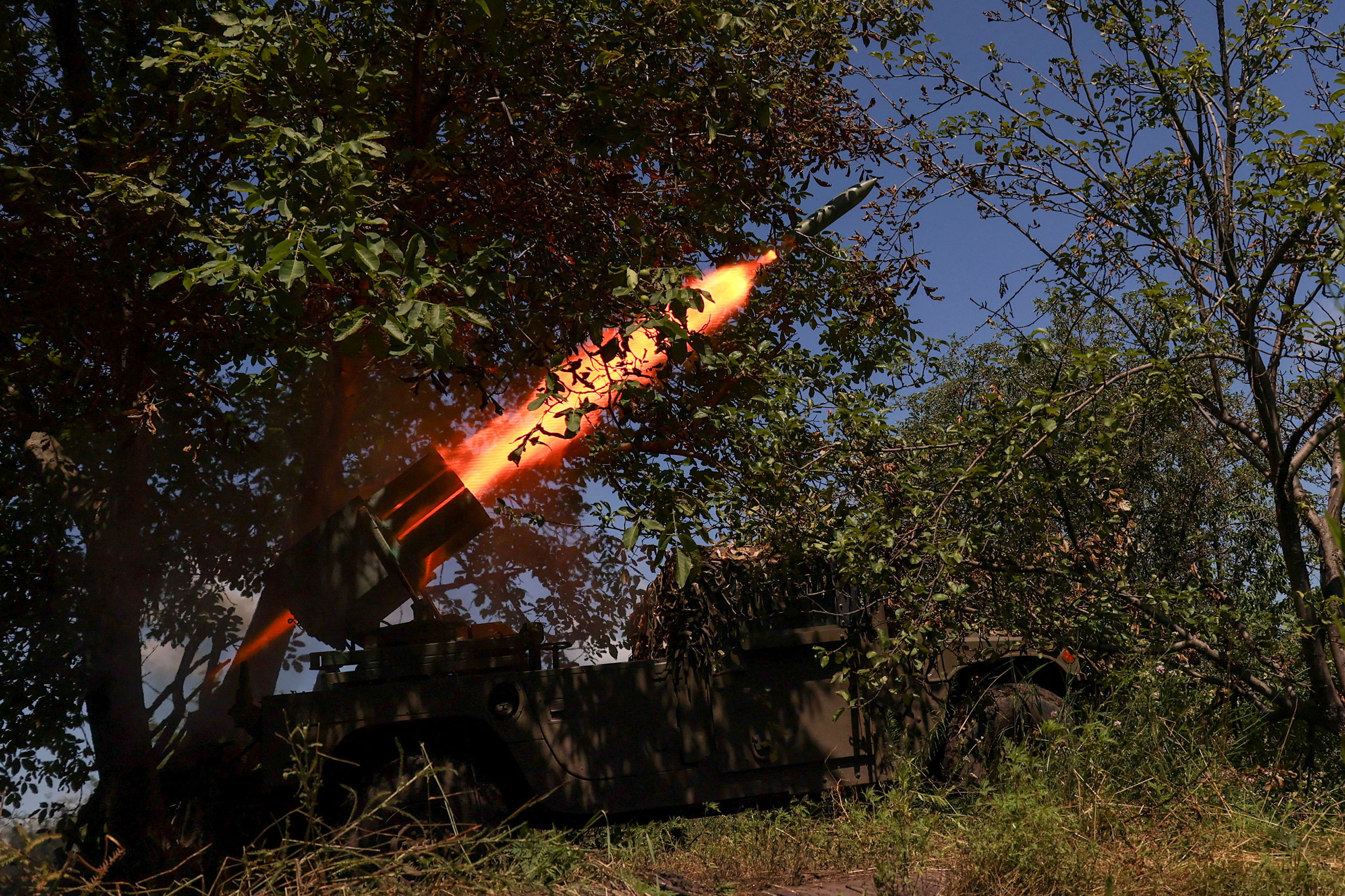 Ukrainian servicemen fire a rocket at Russian troops near the town of Bakhmut in Donetsk region of Ukraine on Monday.