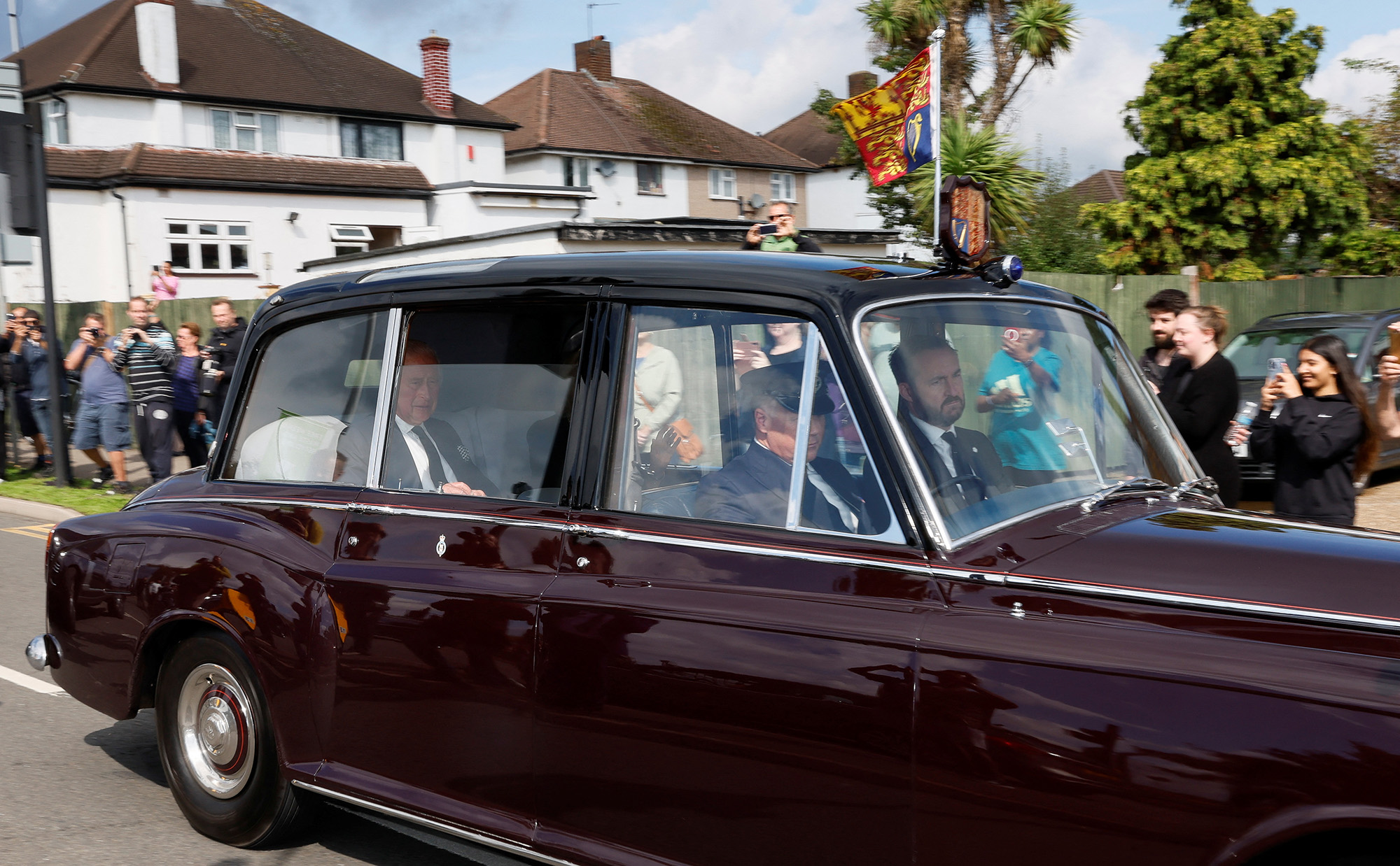 A limousine carrying Britain's King Charles and Queen Camilla leaves RAF Northolt, near London, England, on September 9.