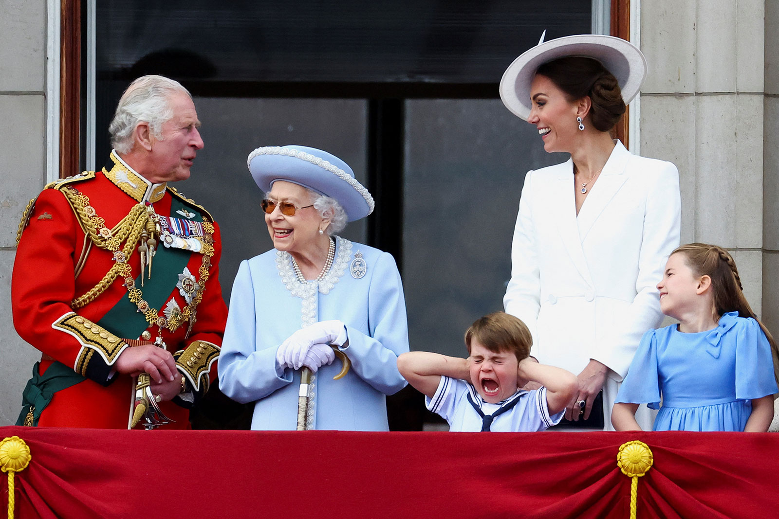 Britain's Queen Elizabeth, Prince Charles and Catherine, Duchess of Cambridge, along with Princess Charlotte and Prince Louis appear on the balcony of Buckingham Palace during the Queen's Platinum Jubilee celebrations in London on June 2.