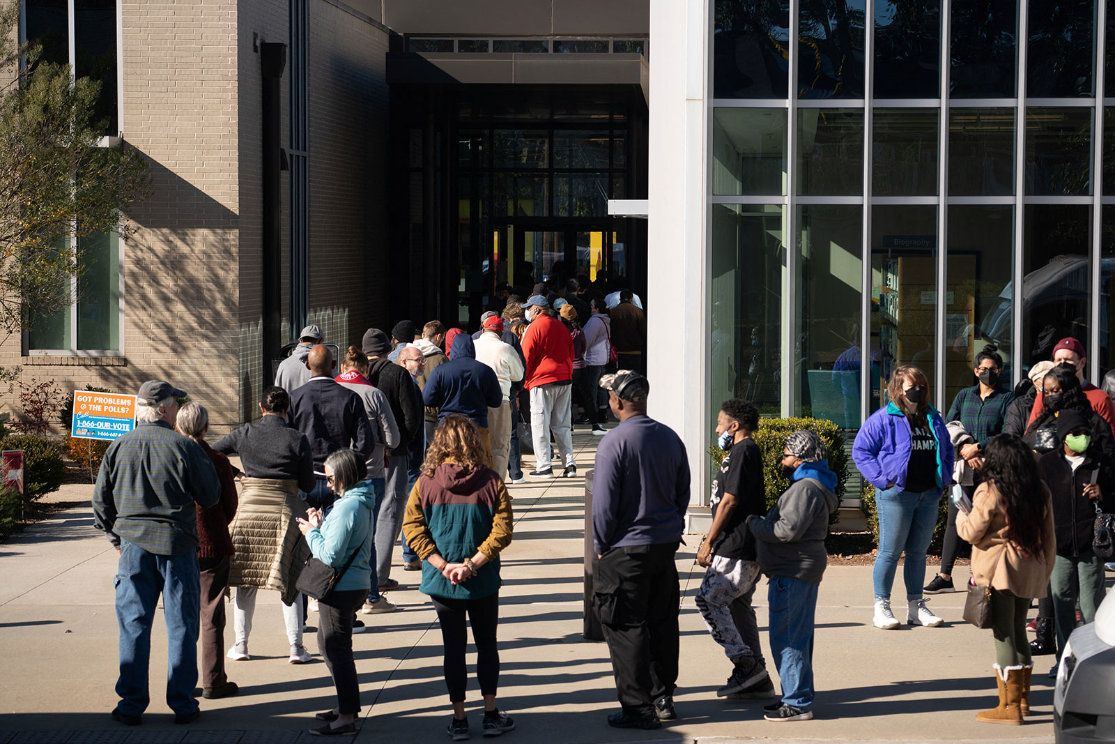 Voters line up at Metropolitan Library to cast their ballots in the runoff election in Atlanta on November 29. 