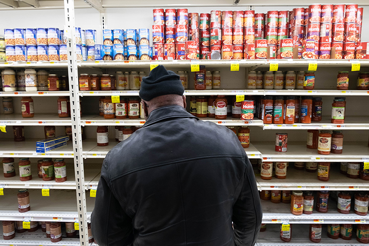 A man shops at a grocery store in Brooklyn amid the coronavirus outbreak on March 31. 