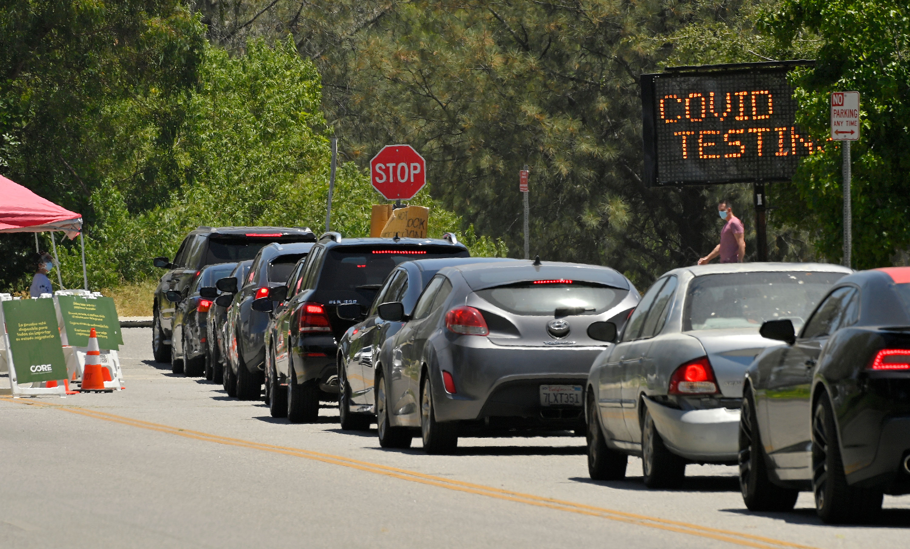 Cars line up for coronavirus testing on July 7 in Los Angeles. 