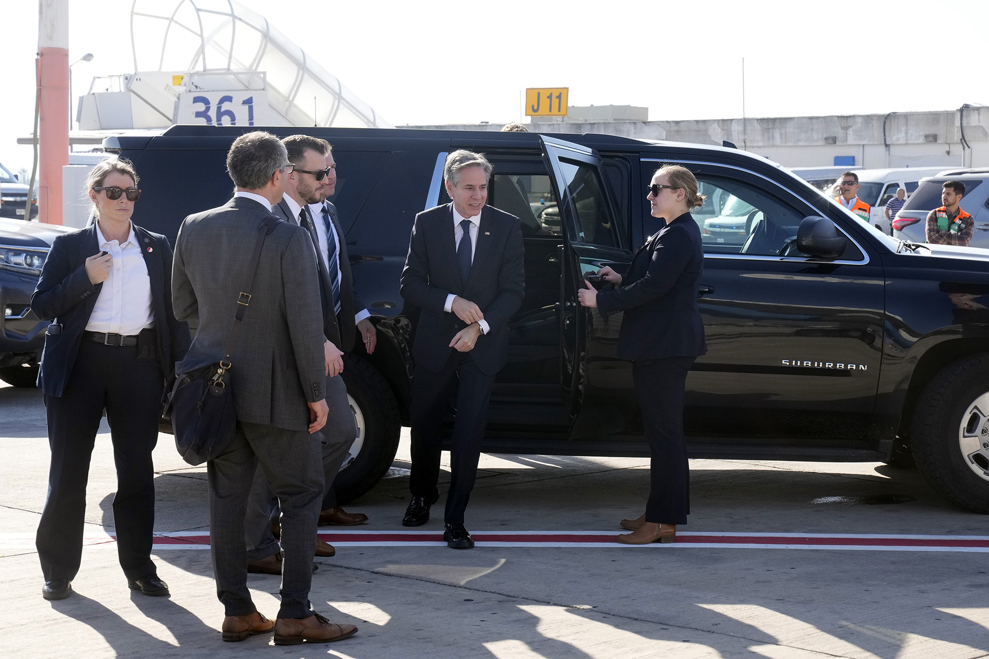 U.S. Secretary of State Antony Blinken gets out of the car as he arrives to board his plane at an airport in Tel Aviv, Israel, on February 8.
