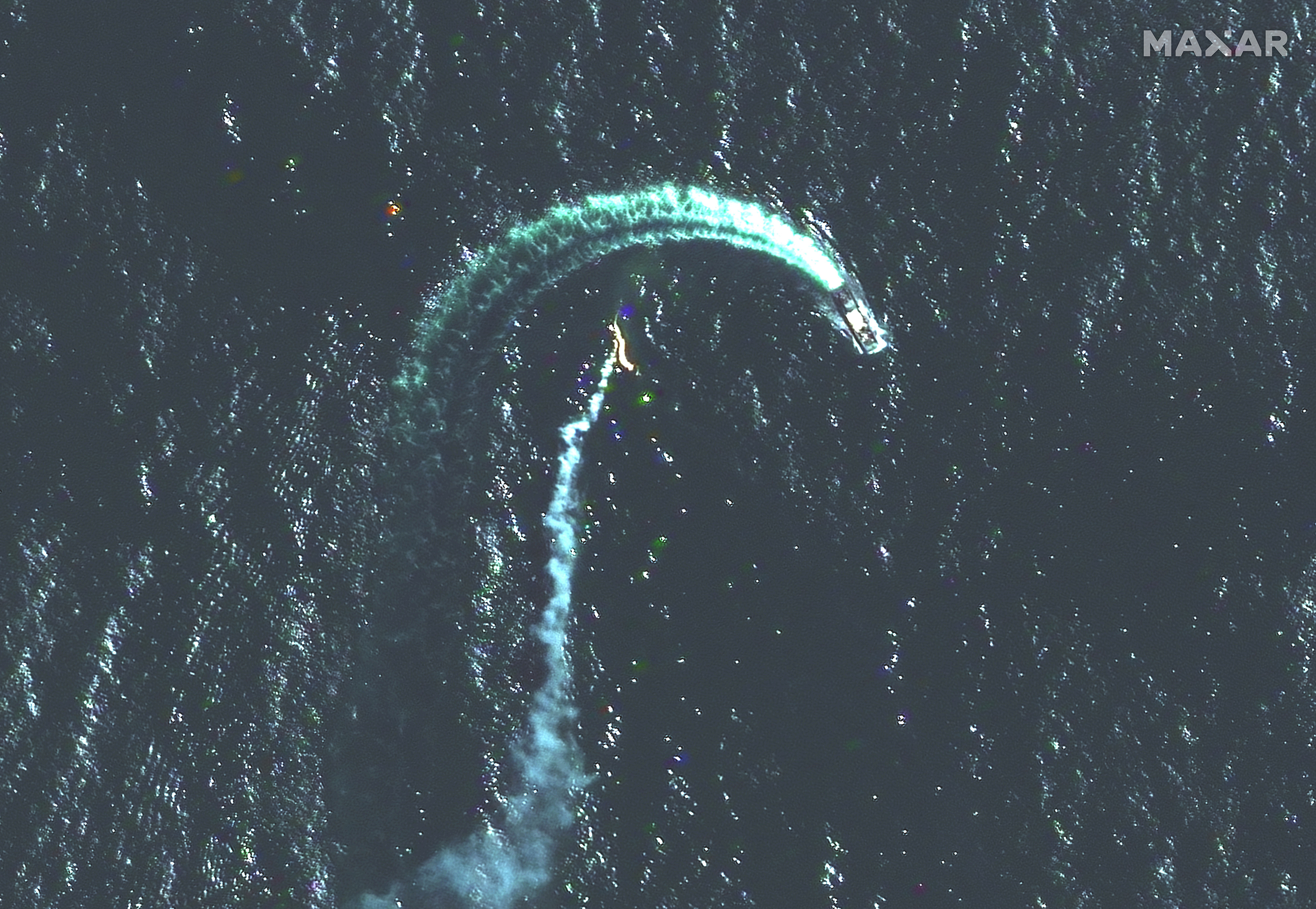 A closer view of the Serna-class landing ship, identified by Maxar, and possible missile contrail seen in a satellite image on May 12.