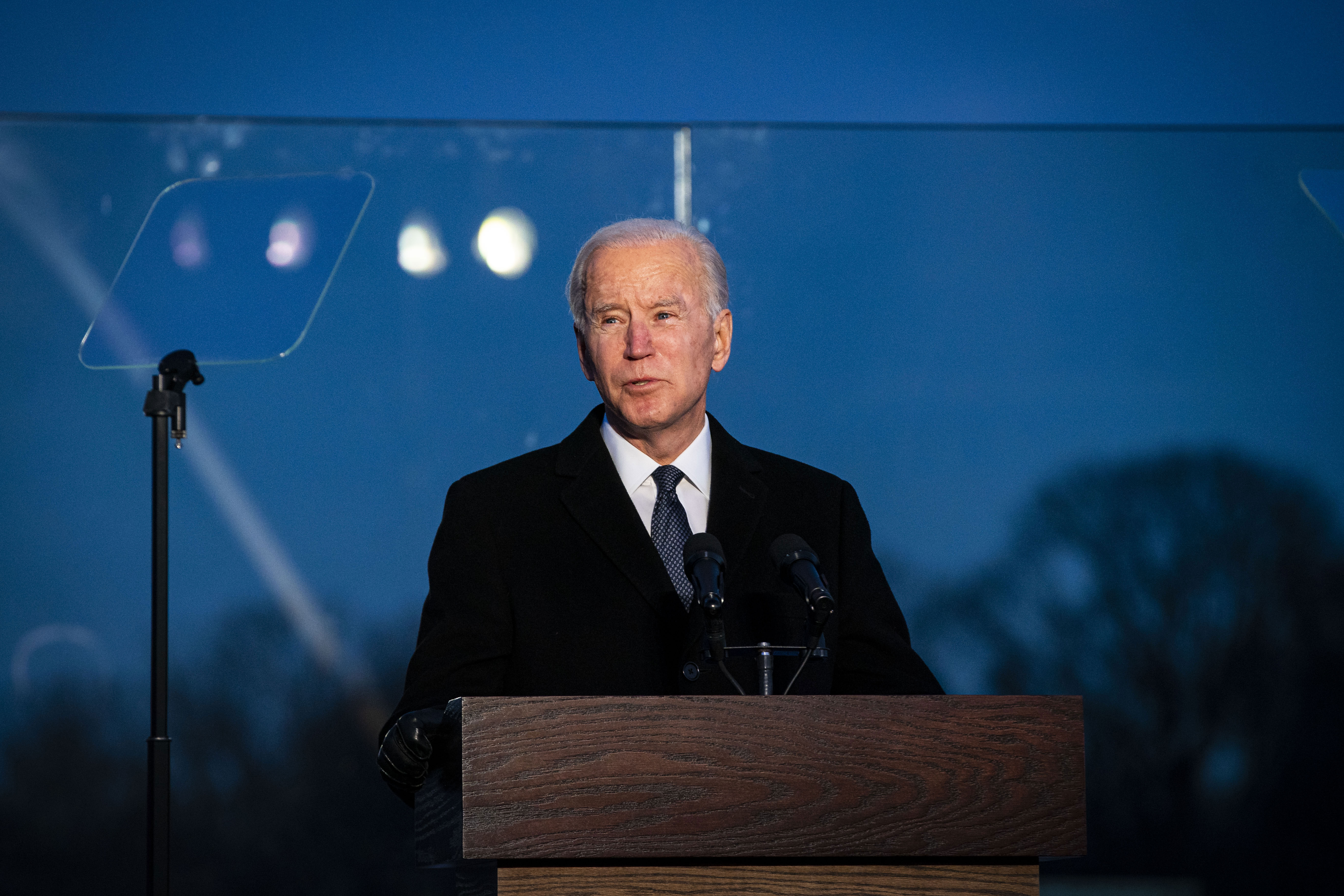 President-elect Joe Biden speaks at the Lincoln Memorial Reflecting Pool in Washington, DC, on January 19. The Covid-19 memorial paid tribute to Americans who have died because of the pandemic.