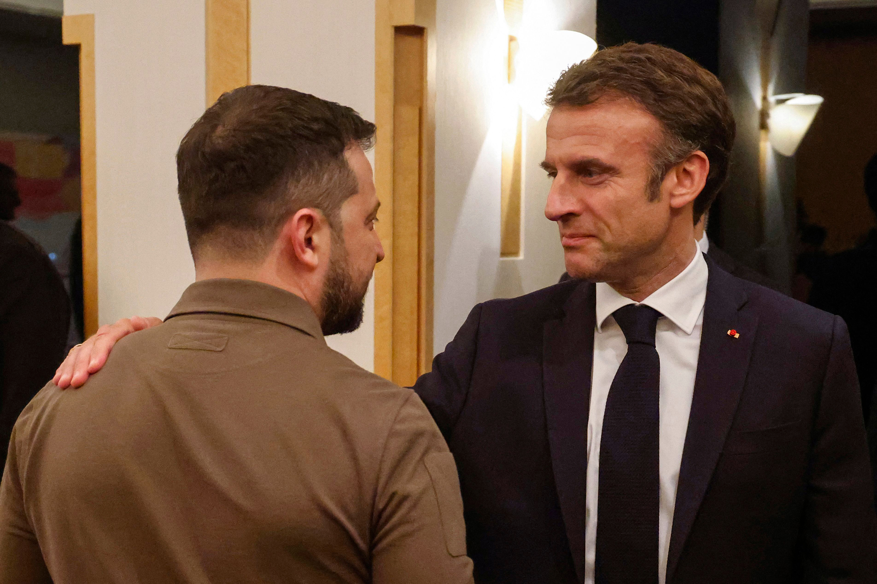Ukrainian President Volodymyr Zelensky meets with French President Emmanuel Macron in Hiroshima, Japan, on May 20. 