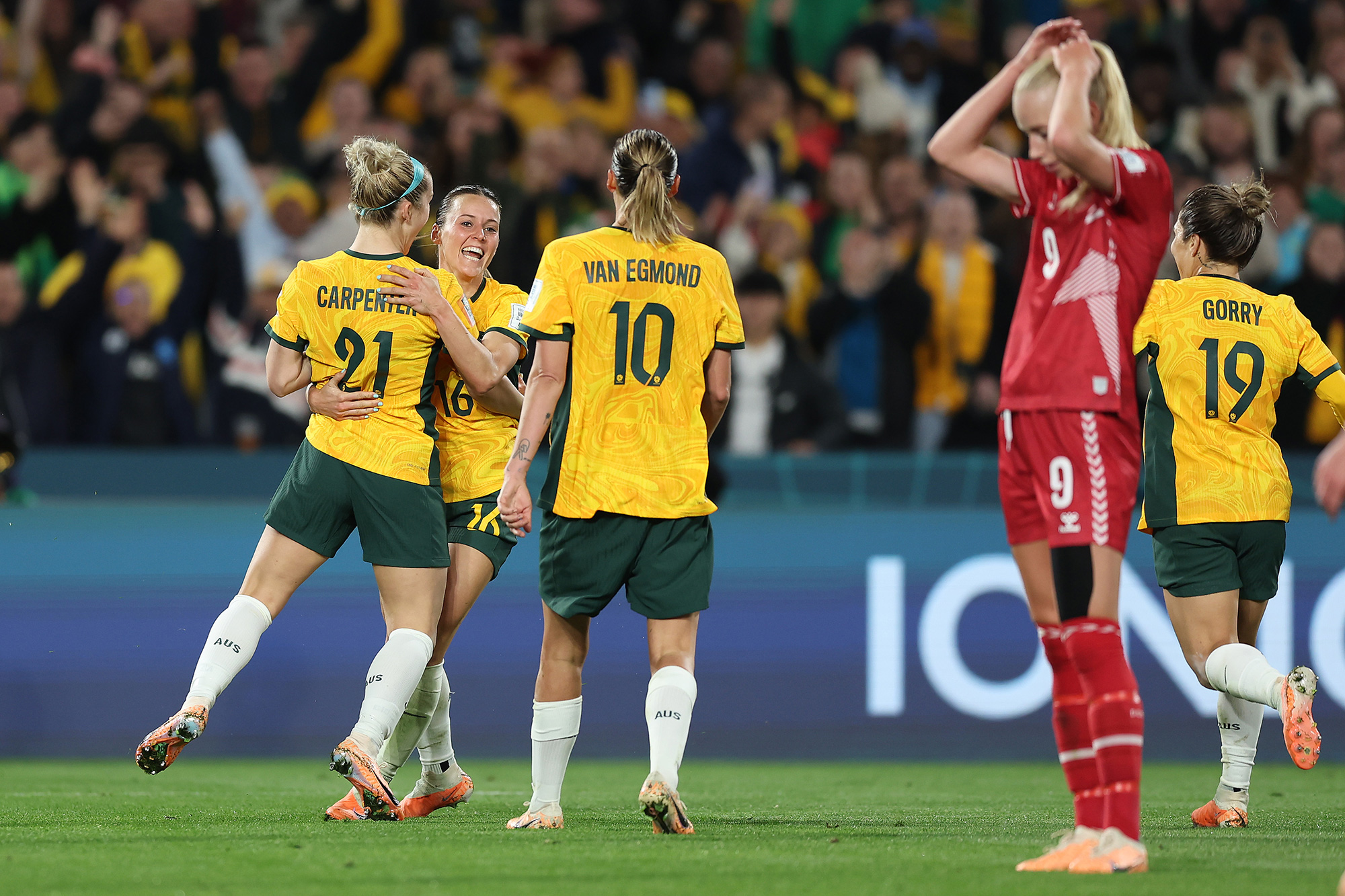 Hayley Raso, second from left, of Australia celebrates with teammates after scoring her team's second goal.