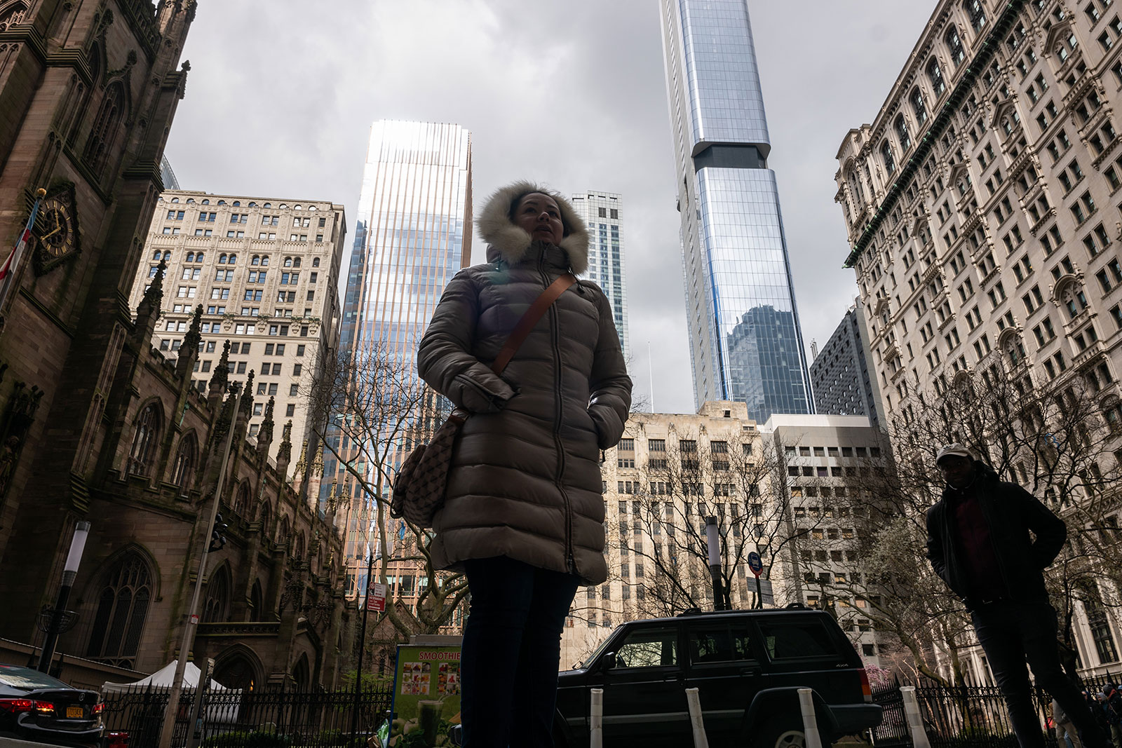 People walk through lower Manhattan following an earthquake on Friday in New York City. 