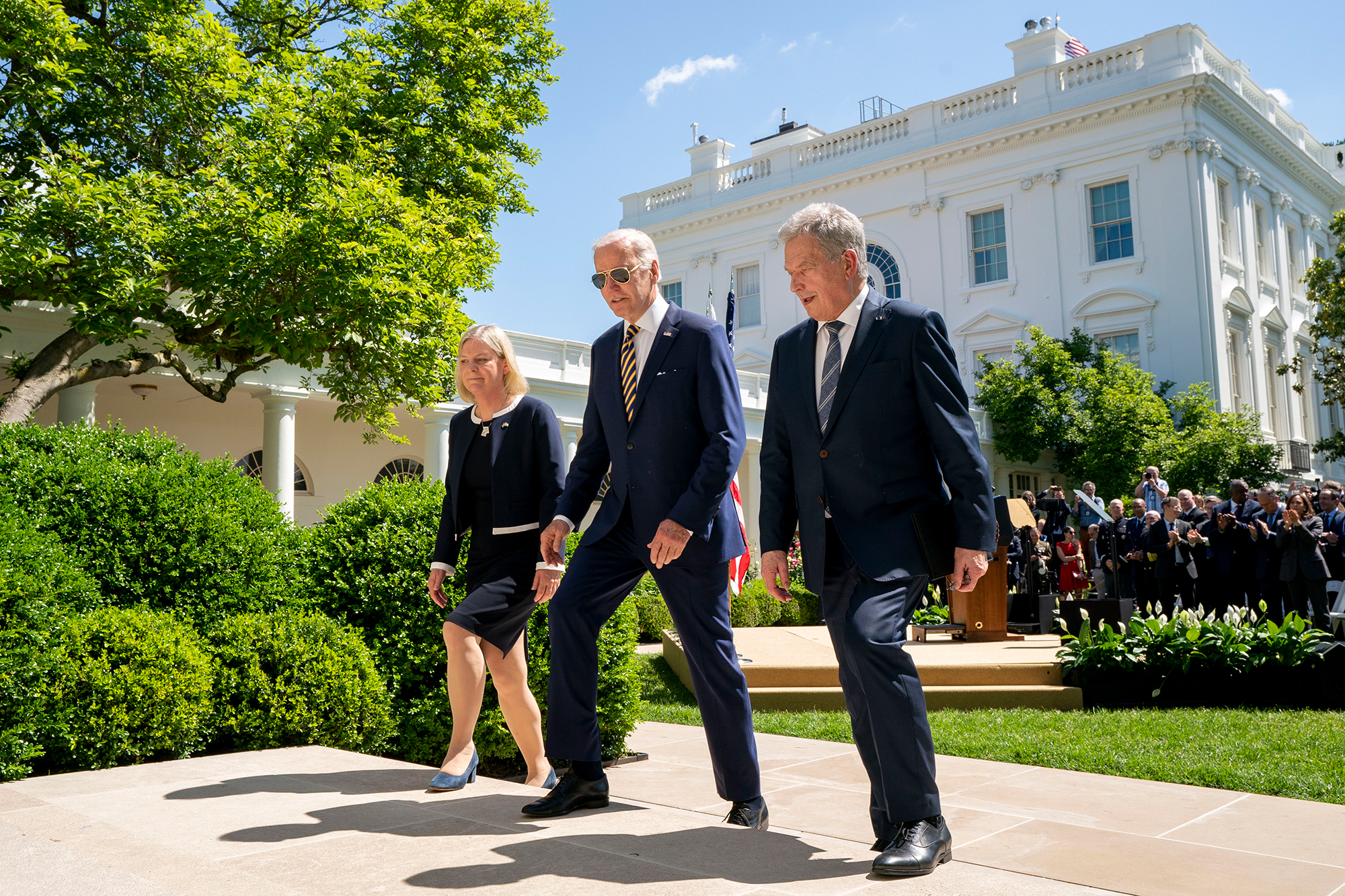Swedish Prime Minister Magdalena Andersson, US President Joe Biden and Finnish President Sauli Niinistö depart the Rose Garden of the White House after speaking on May 19. 