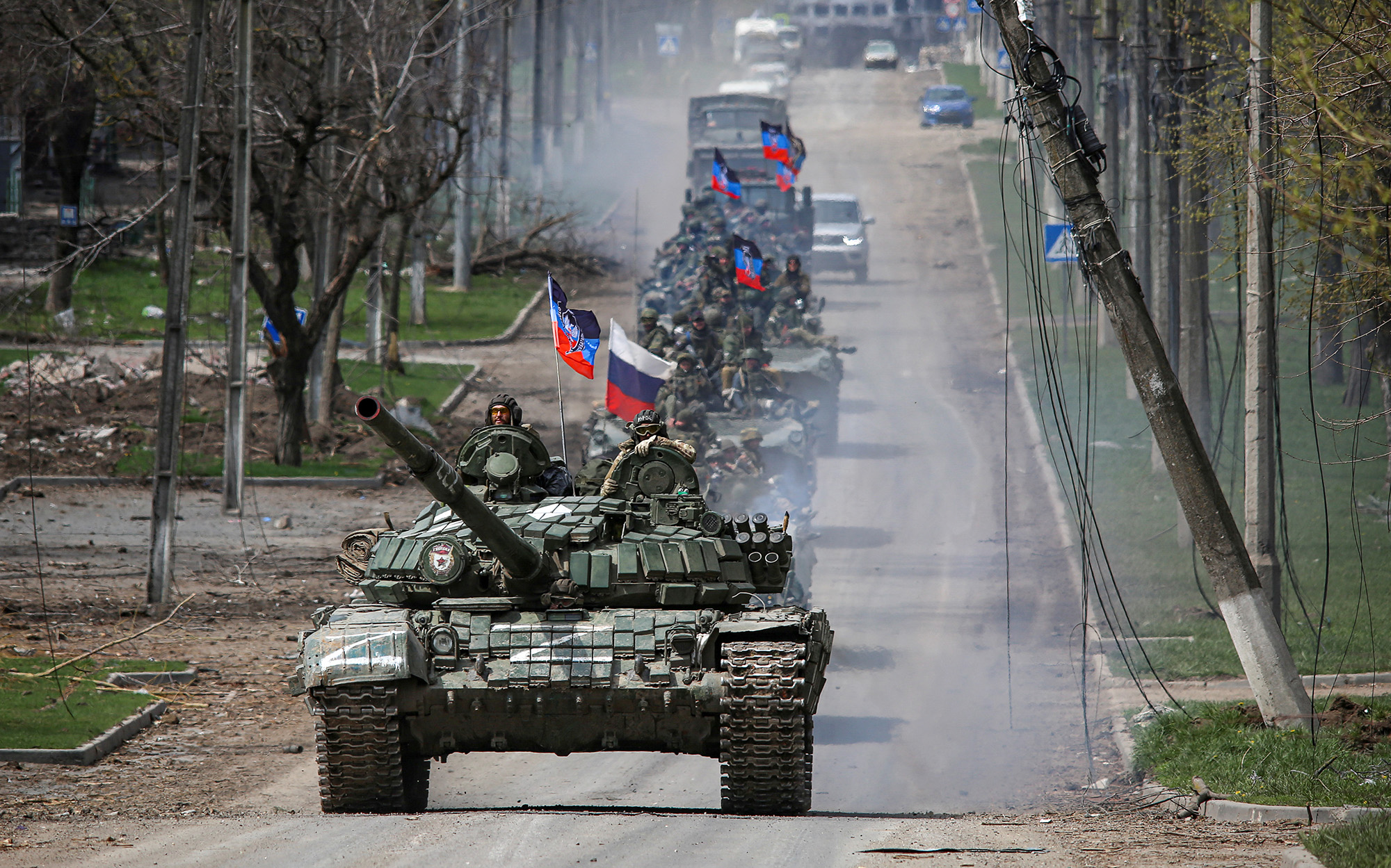 An armoured convoy of pro-Russian troops moves along a road in the southern port city of Mariupol, Ukraine, on April 21.