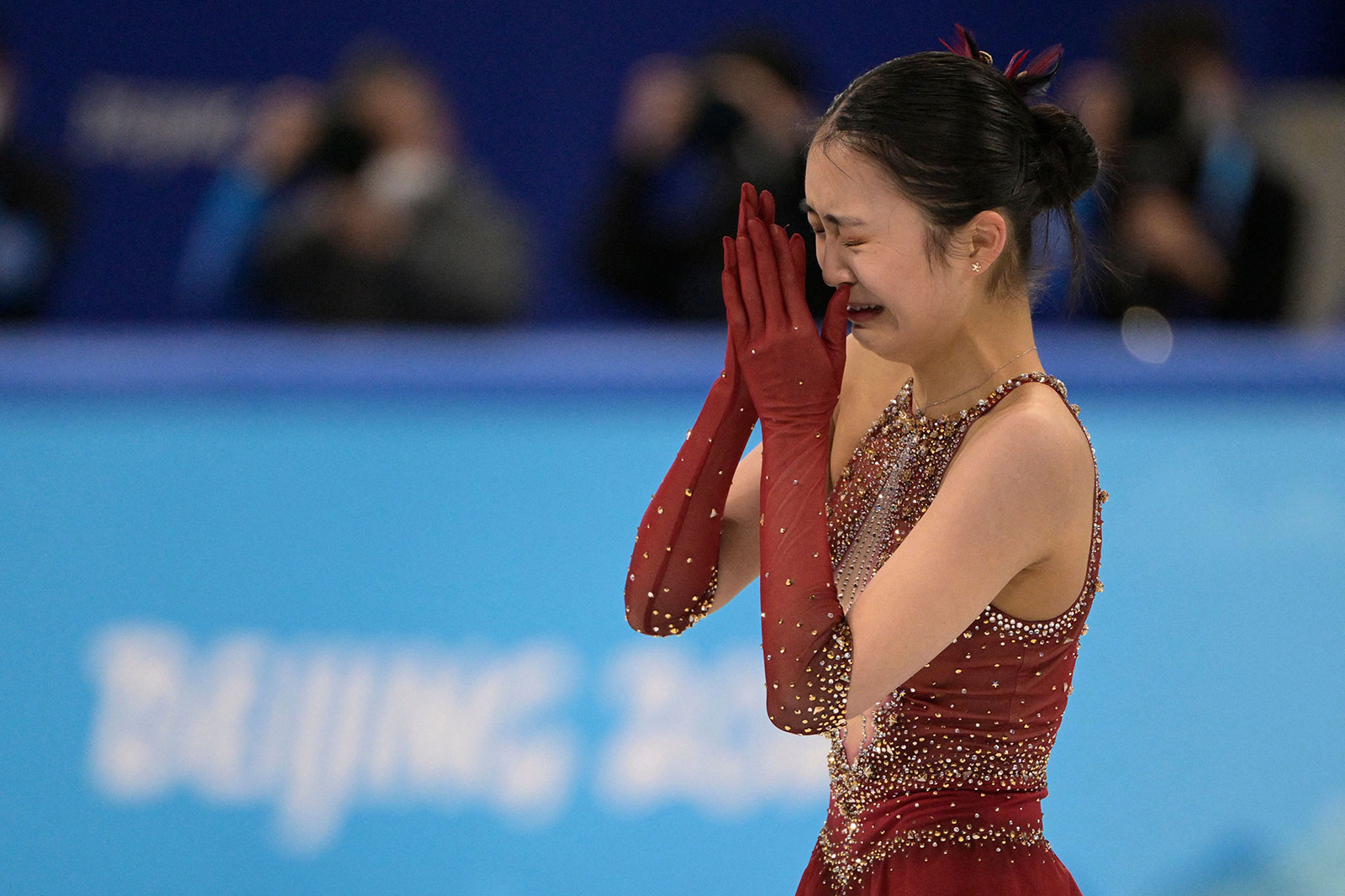 Chinese figure skater Zhu Yi breaks down in tears after competing in the team event on February 7.