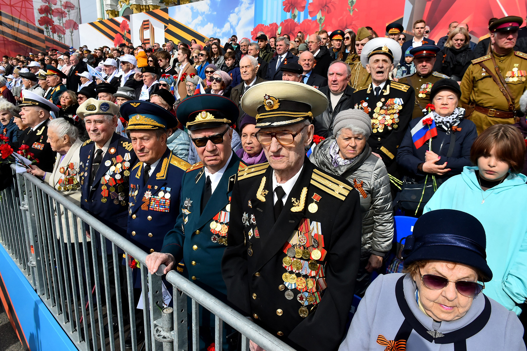 Veterans watch the Victory Day military parade on Dvortsovaya Square in Saint Petersburg, Russia, on May 9.