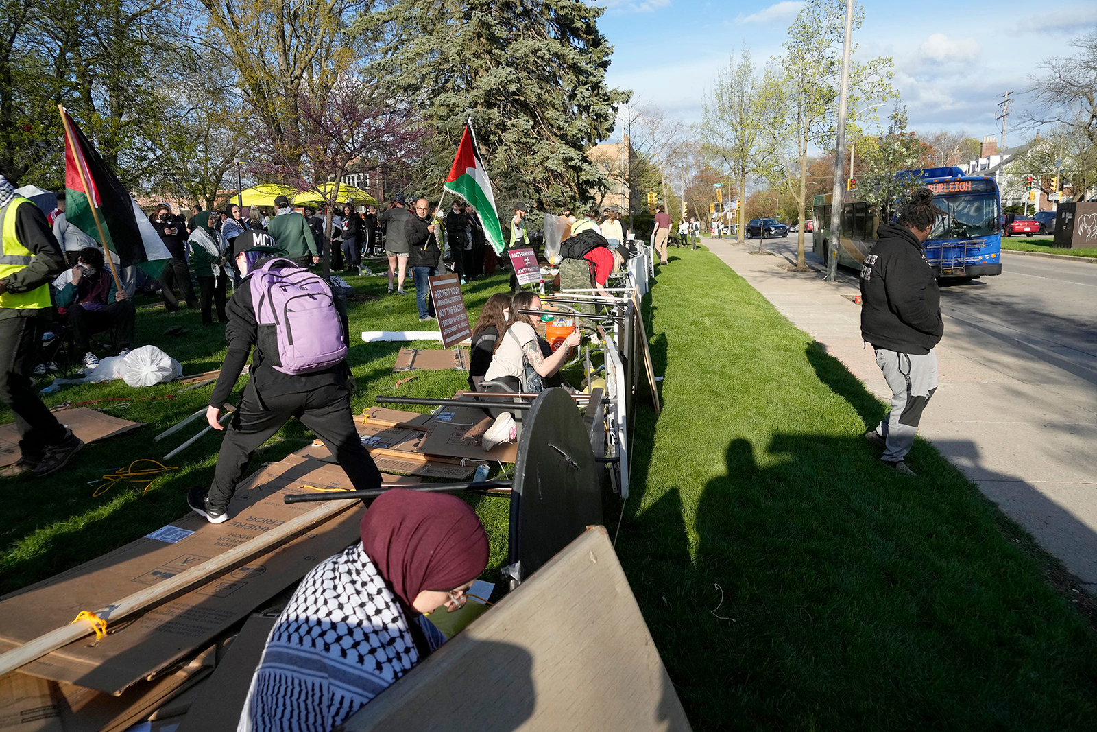 Demonstrators set up tables as protection against a possible police intervention as they protest over the Israel-Hamas war at the University of Wisconsin-Milwaukee on Monday. 
