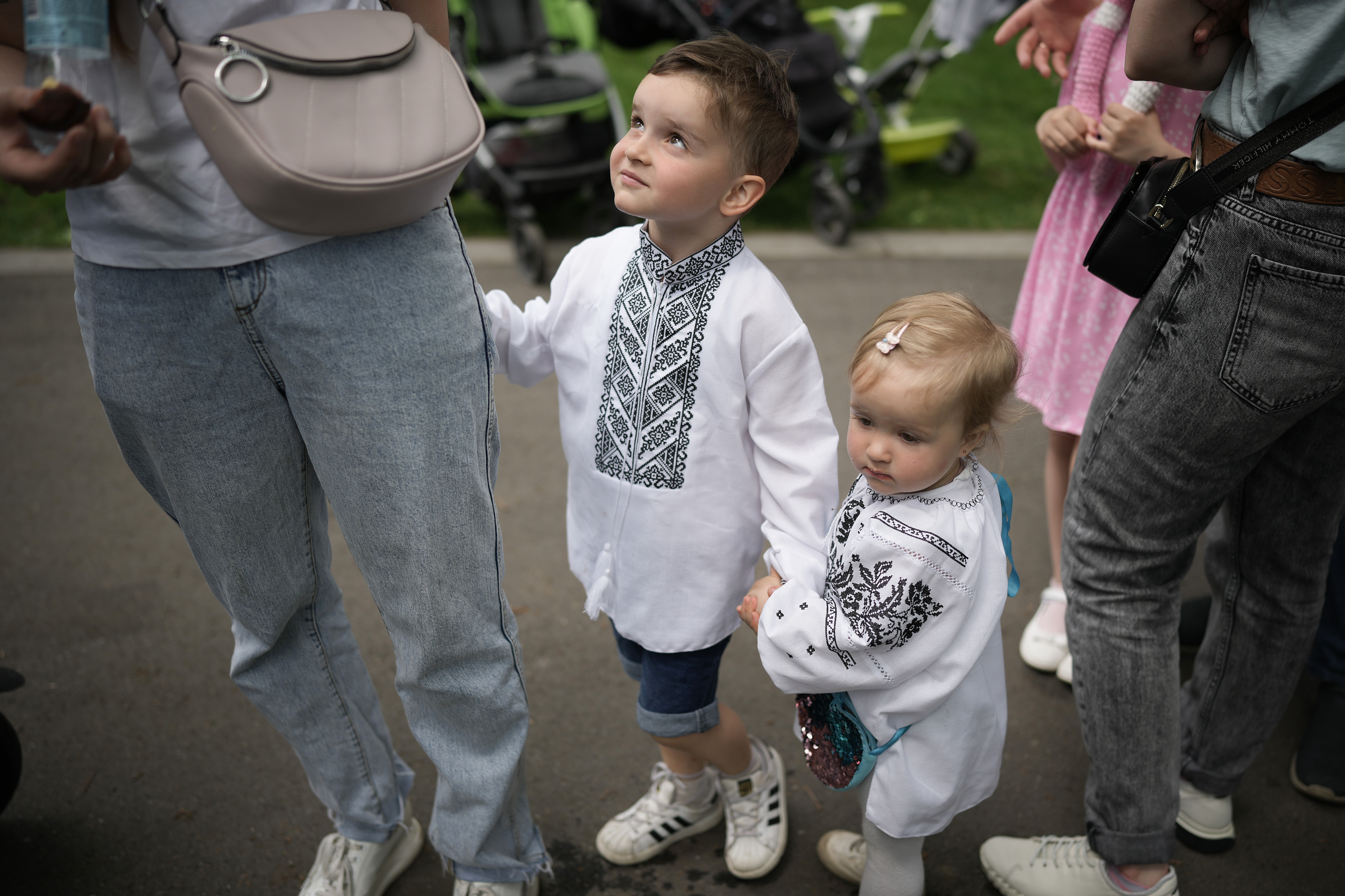 Children in Bucha wear traditional dress as they take part in events to mark Children's Day on June 1, in Bucha, Ukraine.  