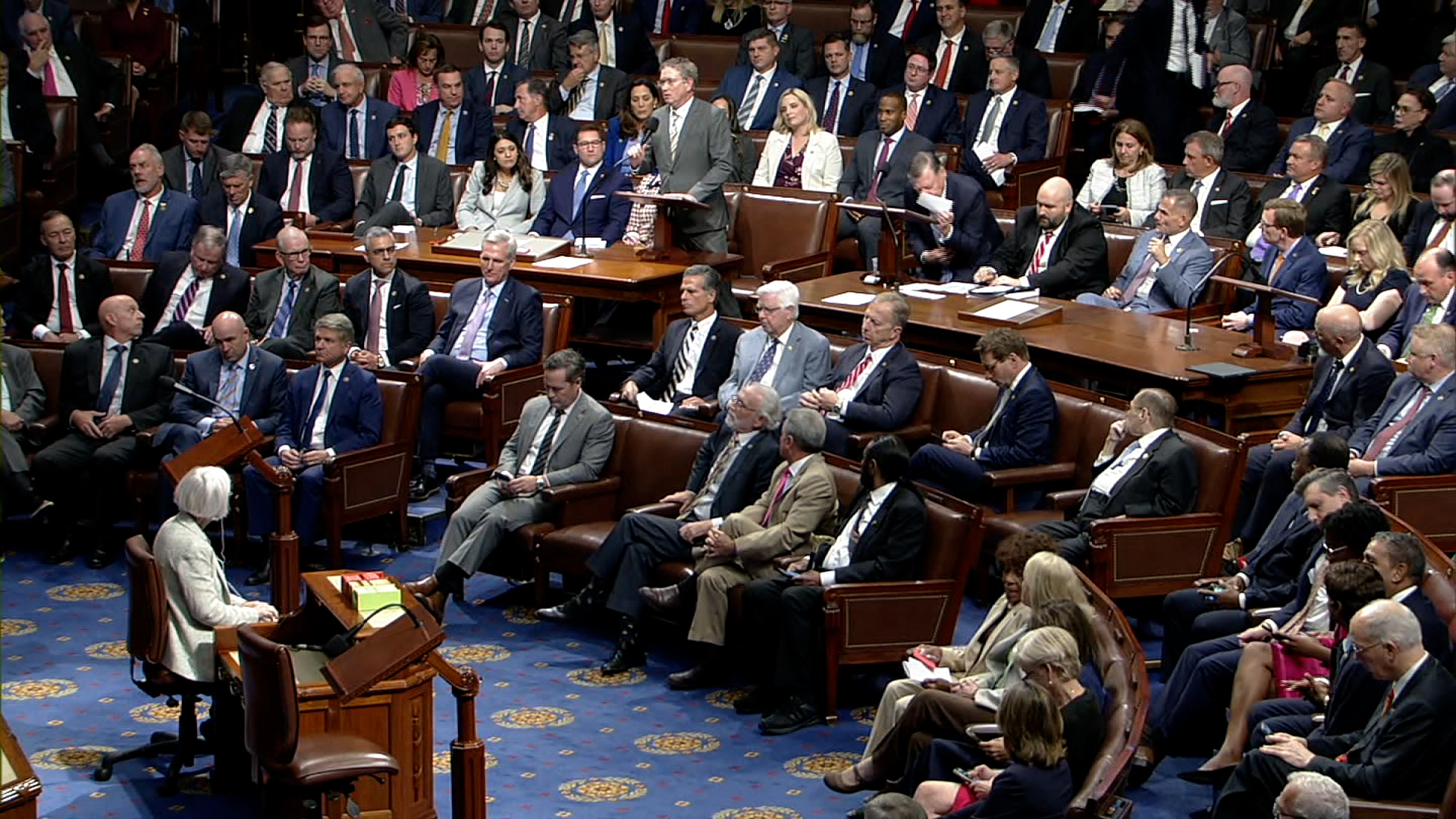 House Speaker Kevin McCarthy sits in the second row on the floor while members debate whether to remove him at the Capitol on Tuesday.