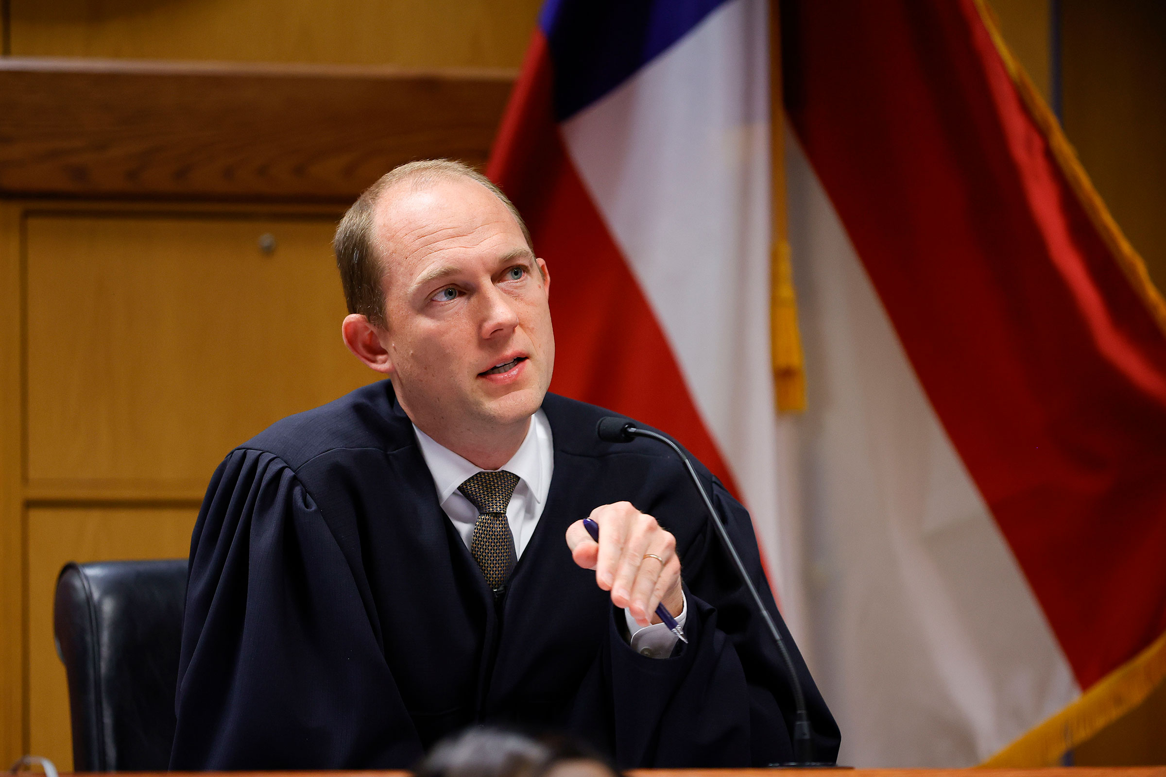 Judge Scott McAfee presides in court during a hearing in the case of the State of Georgia v. Donald John Trump at the Fulton County Courthouse on March 1, in Atlanta. 