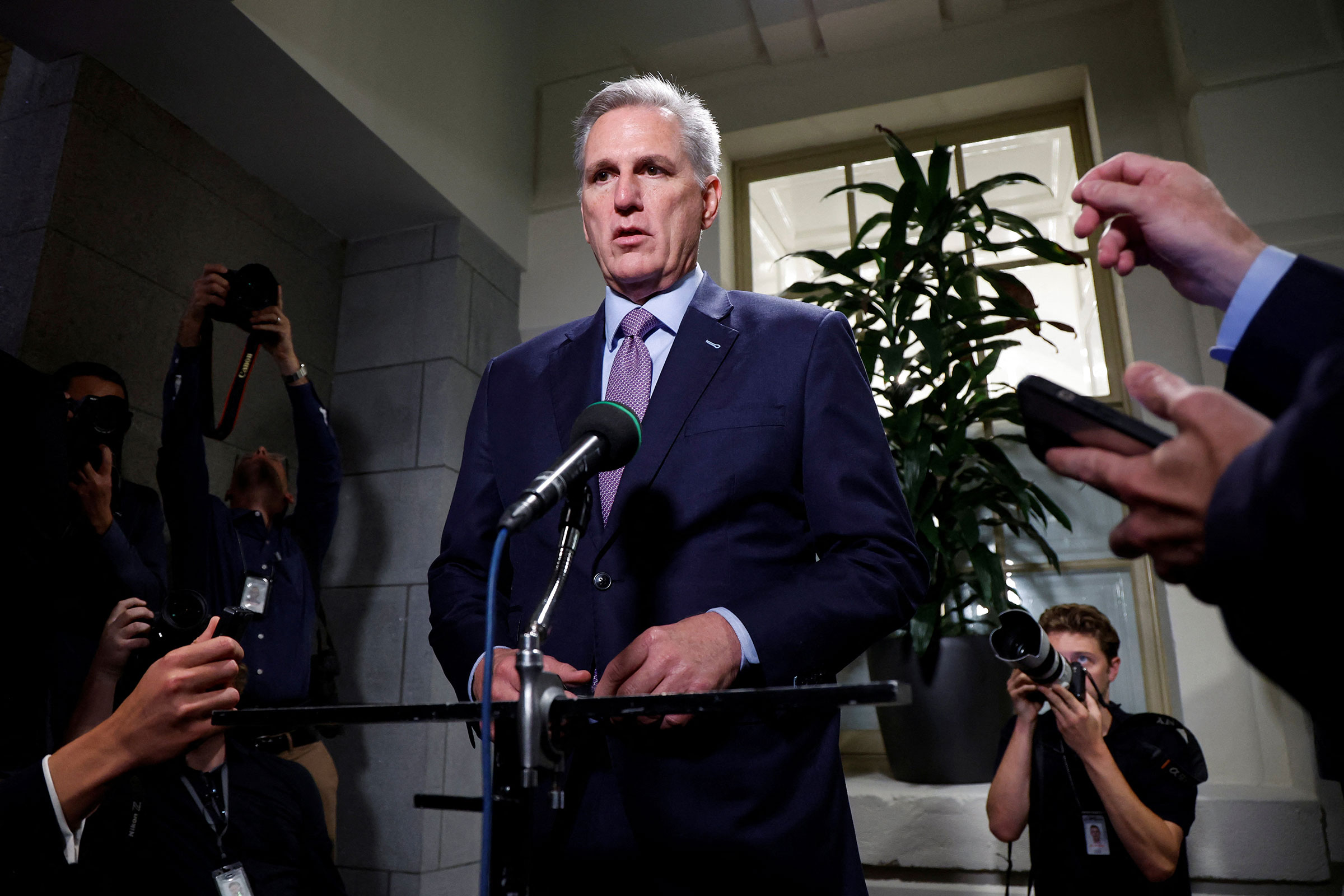 House Speaker Kevin McCarthy speaks with reporters after a House Republican conference meeting at the US Capitol in Washington, DC, on Tuesday.