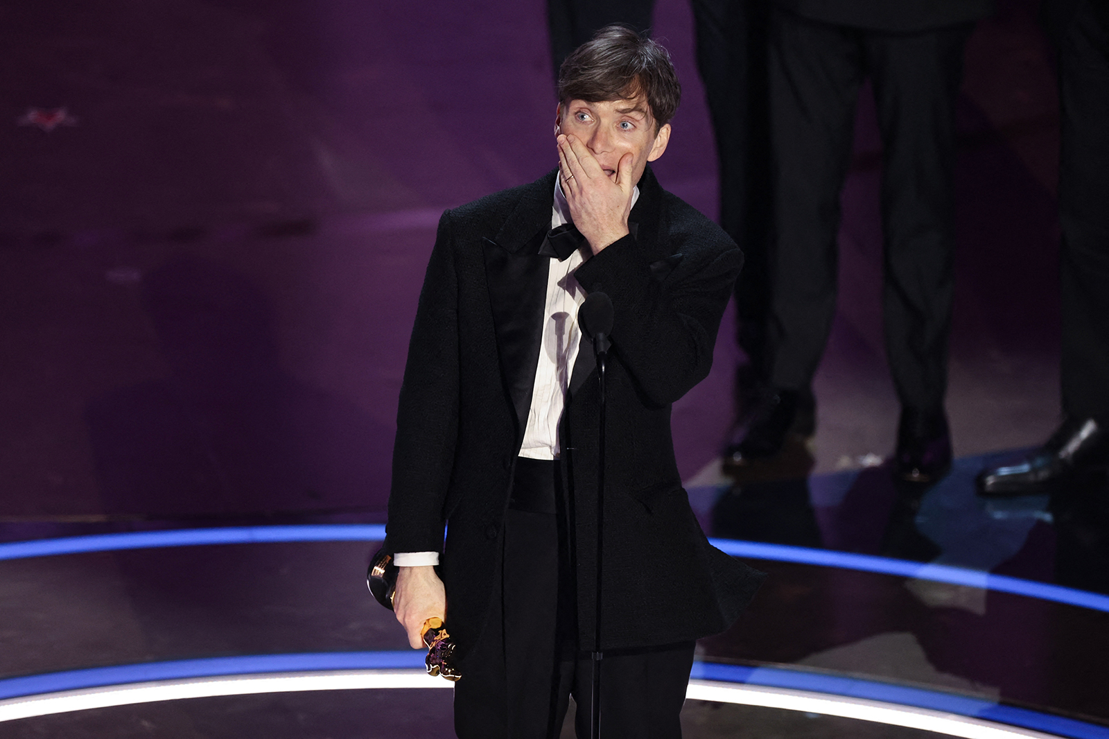 Cillian Murphy accepts the award for best performance by an actor in a leading role for "Oppenheimer.” 