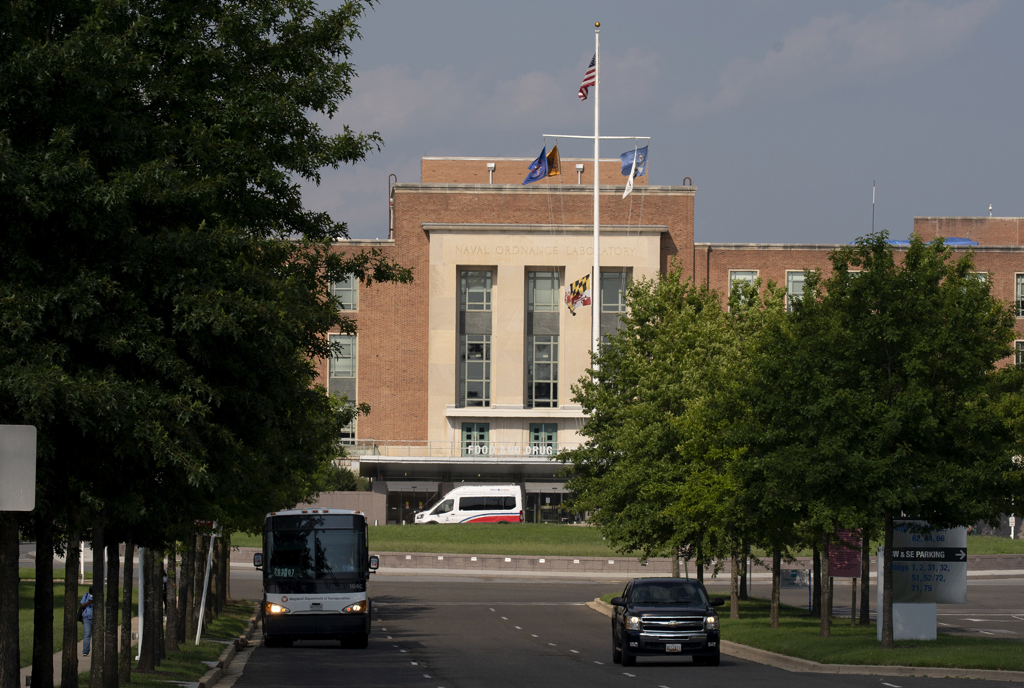 Vehicles drive in front of the U.S. Food and Drug Administration headquarters in White Oak, Maryland, on August 25.