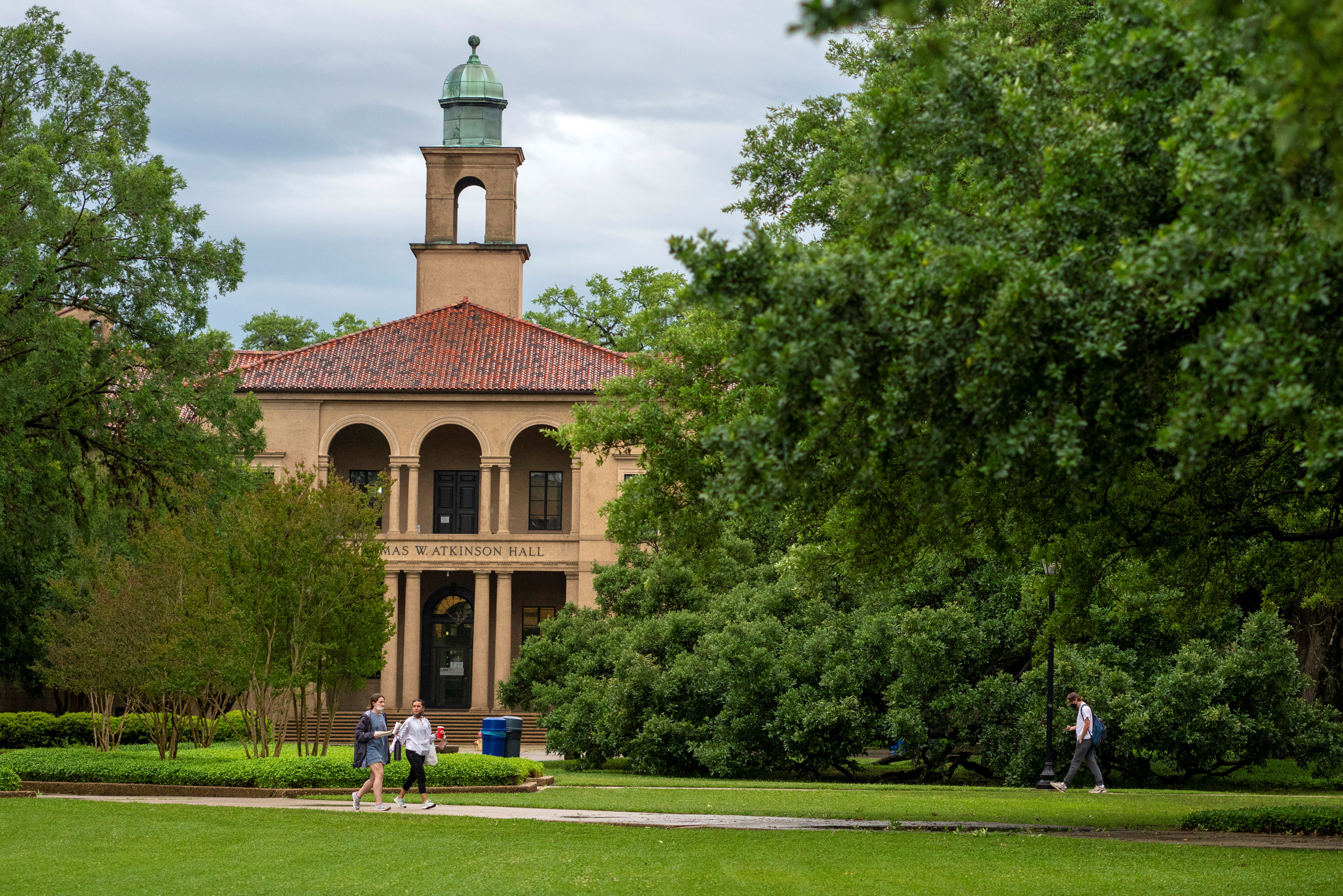 Students walk at the Louisiana State University campus in Baton Rouge, Louisiana, in April 2021.