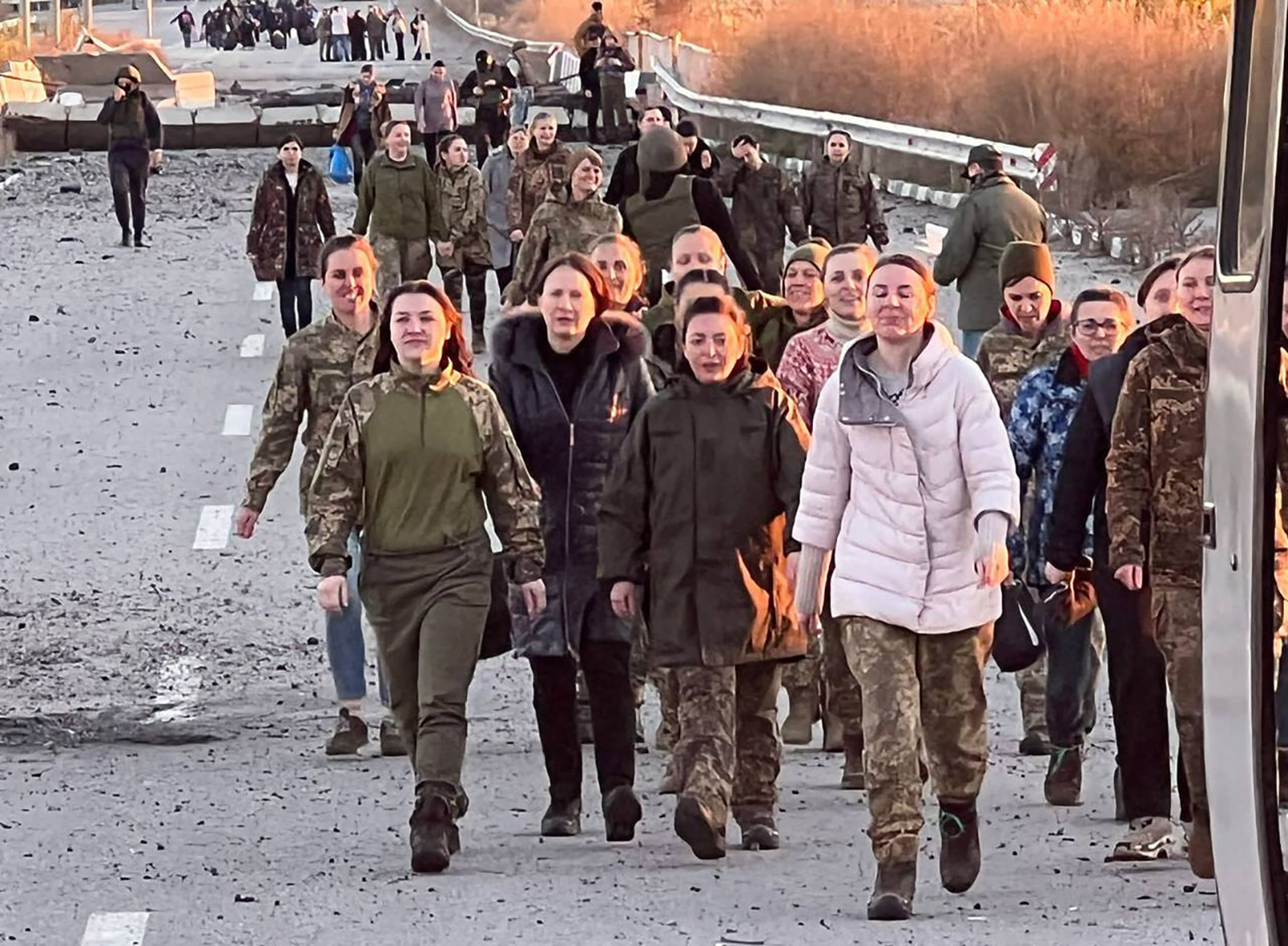 Women walk towards their relatives as part of all-female prisoner swap with Russia on October 17.
