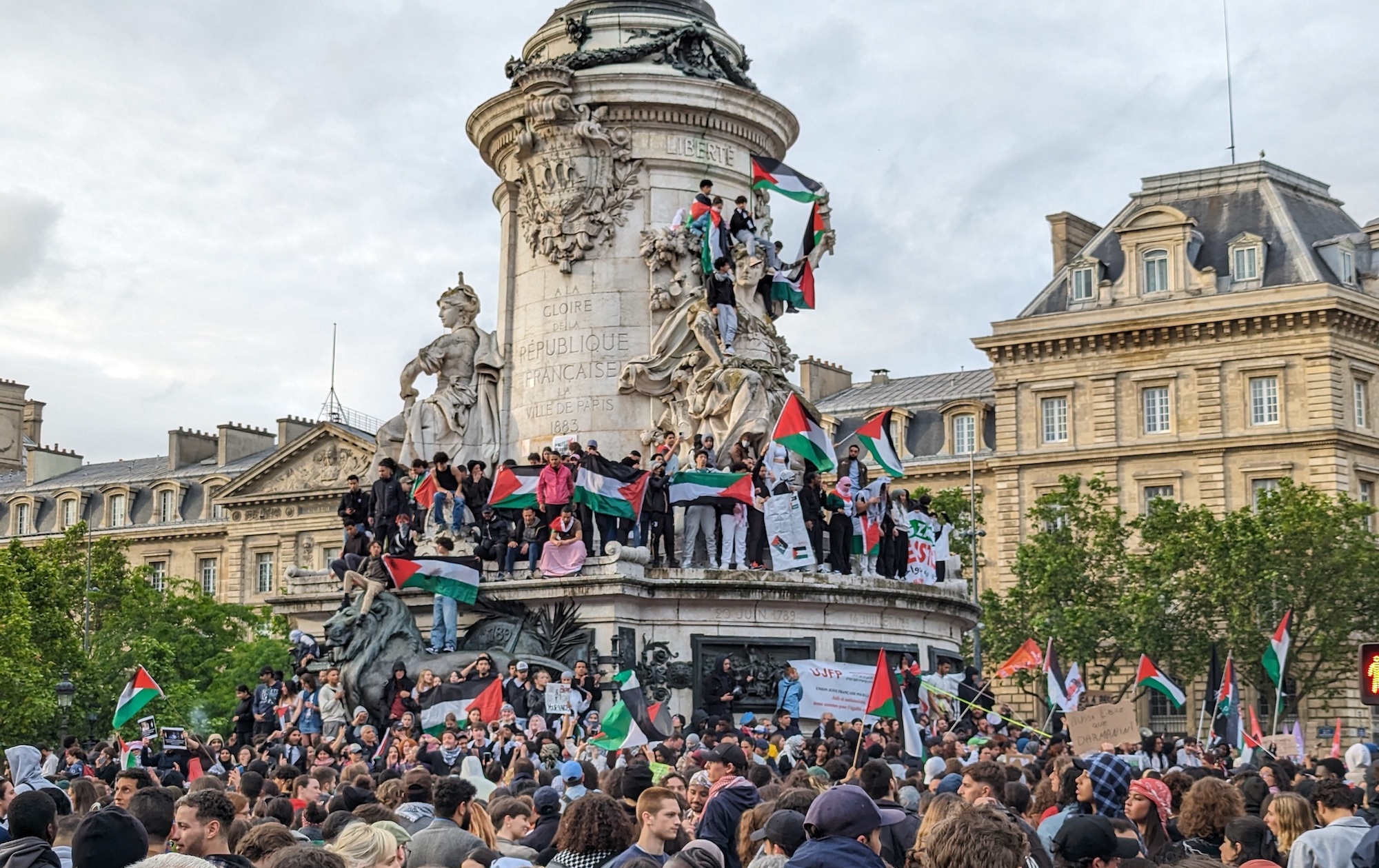 Pro-Palestinian protesters are seen at Republic Square in Paris on Tuesday.