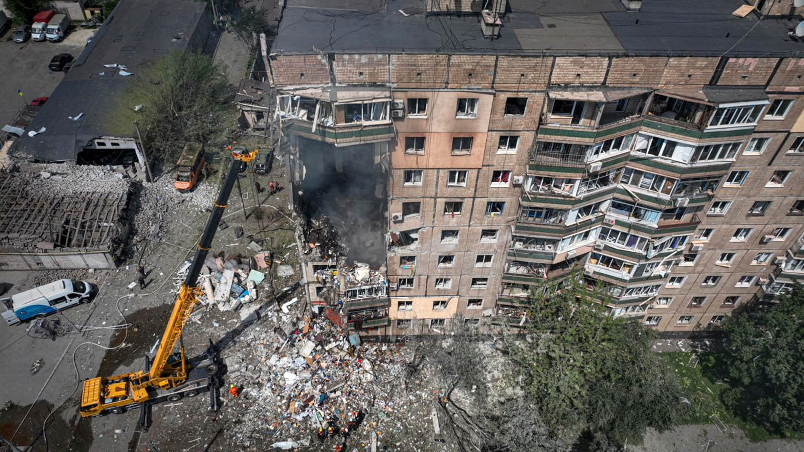 A view of a site of an apartment building heavily damaged by a Russian missile strike in Kryvyi Rih, Ukraine, on July 31, 2023.