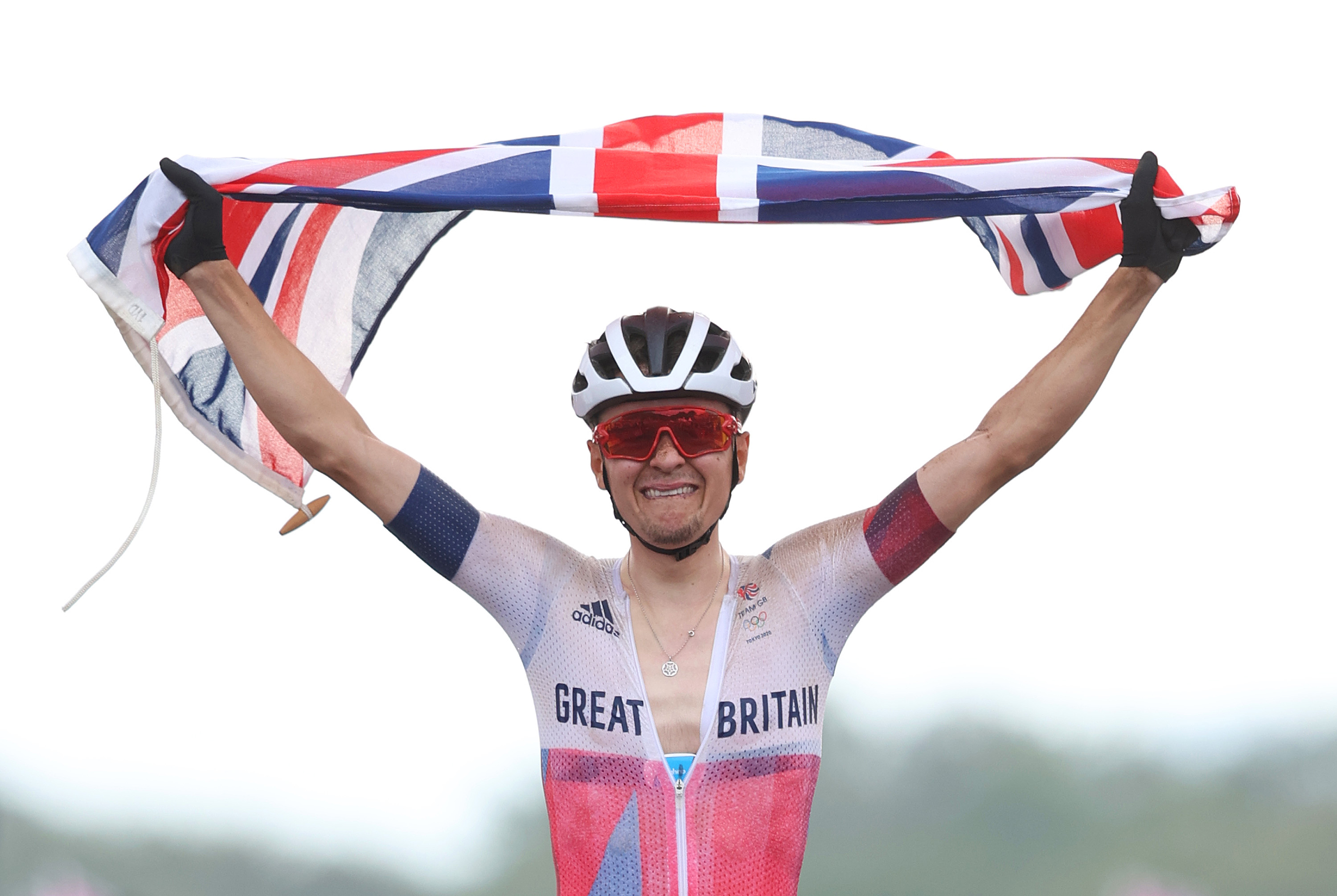 Great Britain’s Thomas Pidcock celebrates winning the gold medal in the mountain bike cross-country race on July 26. 