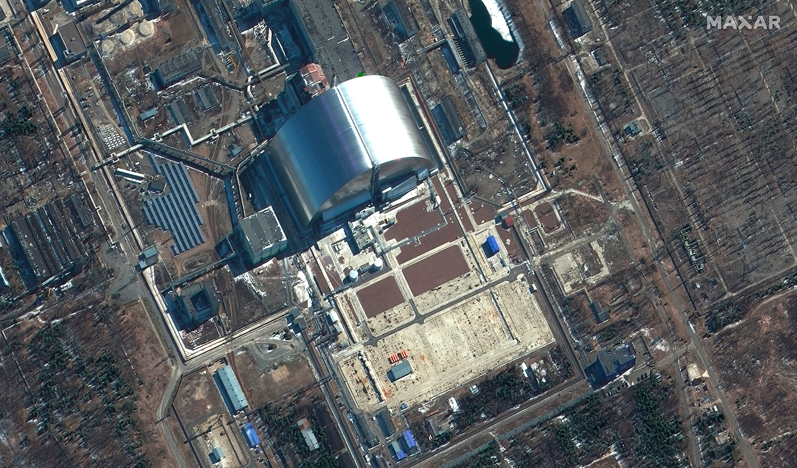 This satellite image provided by Maxar Technologies shows a close view of Chernobyl nuclear facilities, Ukraine, on Thursday, March 10.