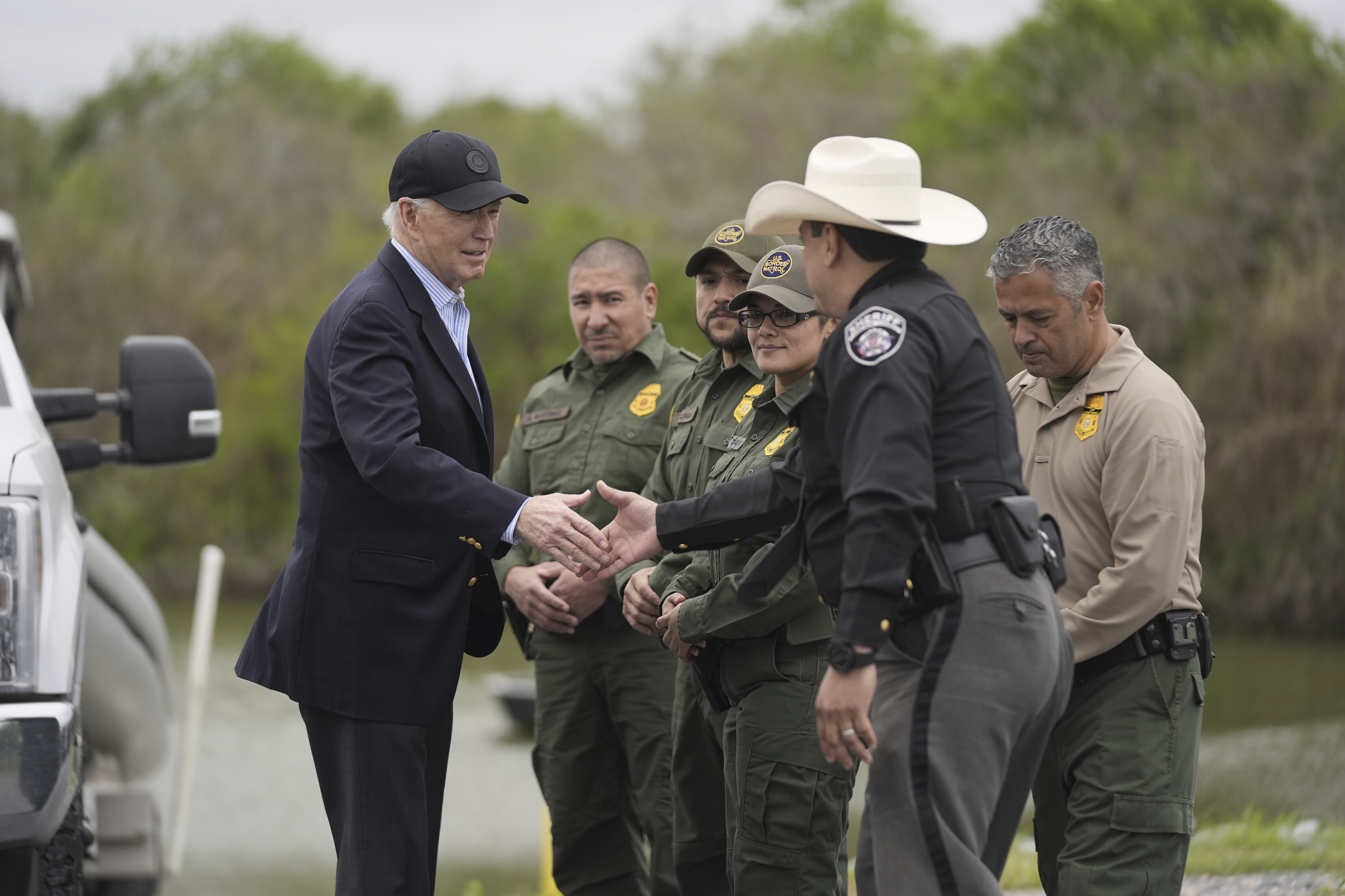 President Joe Biden talks with US Border Patrol and local officials as he looks over the southern border on Thursday, February 29, in Brownsville, Texas.
