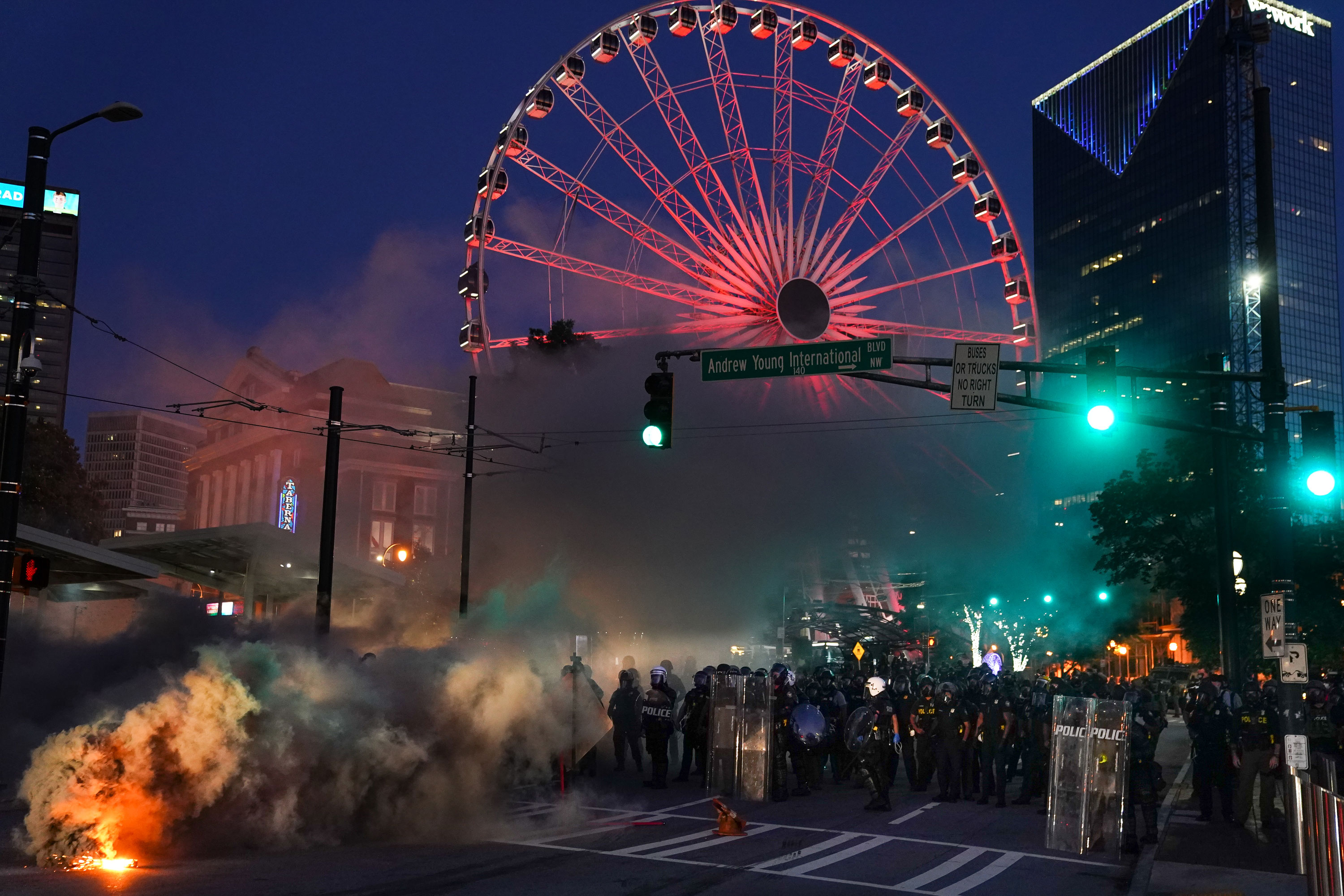 Police arrest 70 in Atlanta as protesters defy curfew