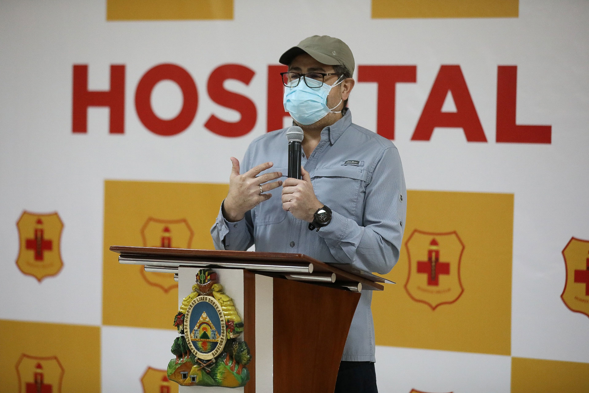 Honduras' President Juan Orlando Hernandez delivers a speech whilst being discharged from hospital after contracting the coronavirus disease at the Military Hospital in Tegucigalpa, Honduras, on July 2. 