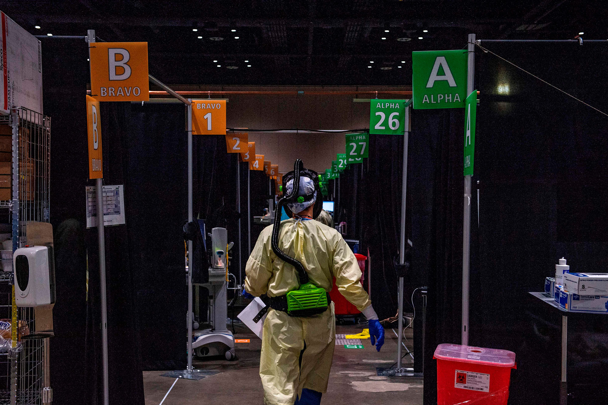 Medical staff monitor and treat sick patients infected with the Covid-19 virus at the UMASS Memorial DCU Center Field Hospital in Worcester, Massachusetts on January 13.