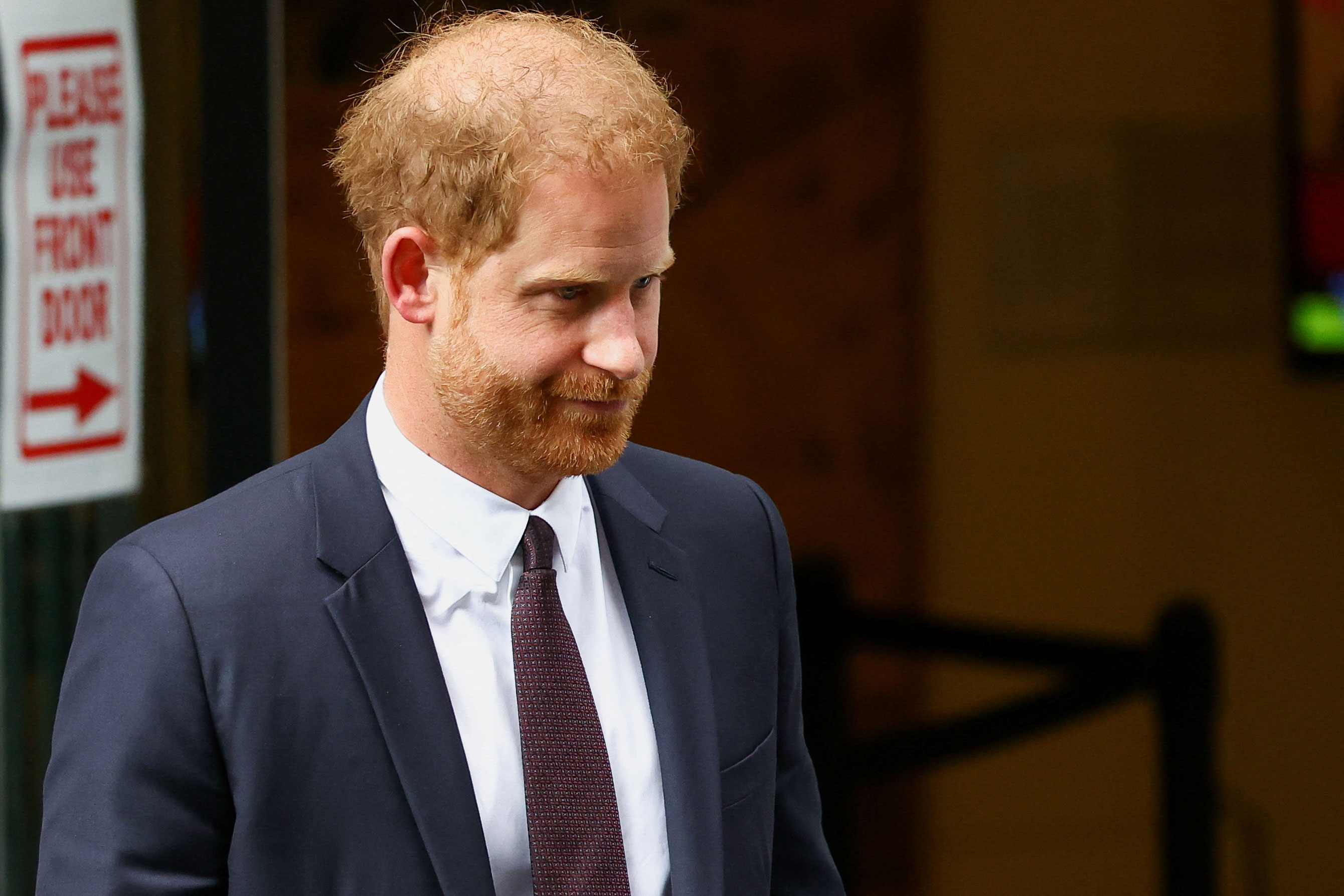 Prince Harry leaves the Rolls Building of the High Court in London on Tuesday.
