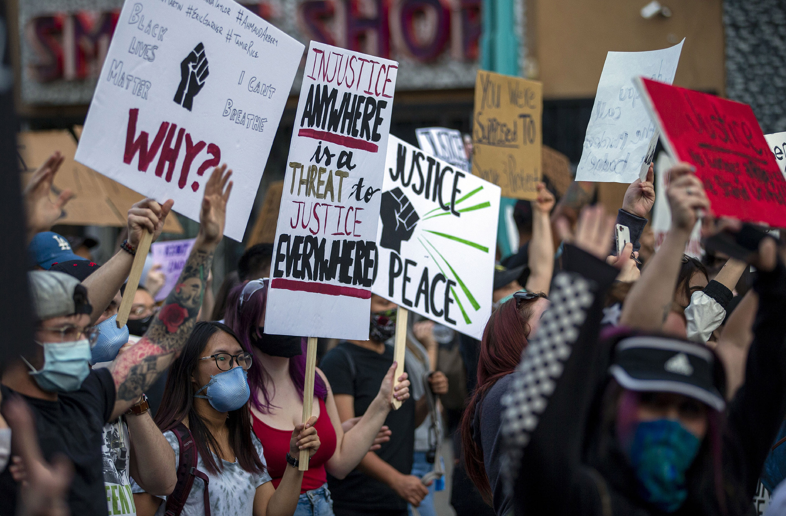 Demonstrators protest the death of George Floyd in downtown Albuquerque, New Mexico, on Sunday, May 31. 