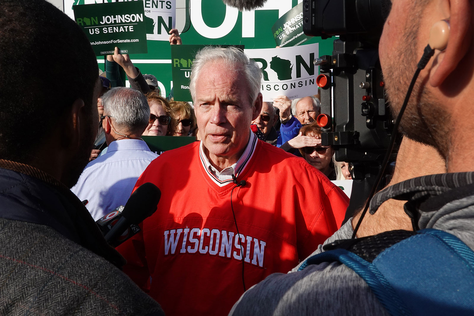 Wisconsin Republican Sen. Ron Johnson speaks to reporters during a campaign stop in Kronenwetter, Wisconsin, on November 3. 