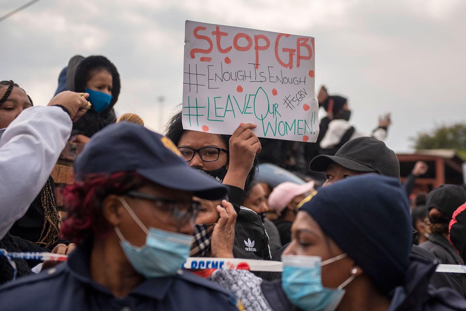 People of the Eersterust community attend the Stop Violence Against Women March in Pretoria, South Africa on June 16. 