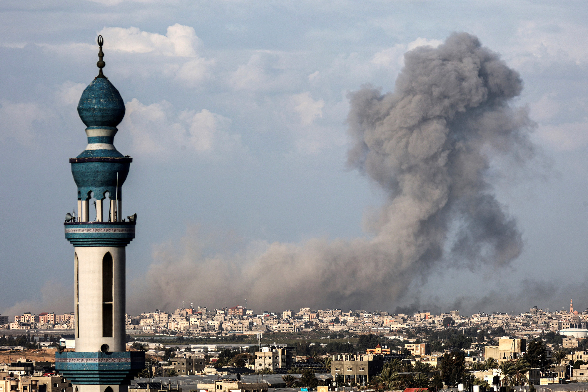 Smoke billows over Khan Younis, southern Gaza, during Israeli bombardment on January 24.