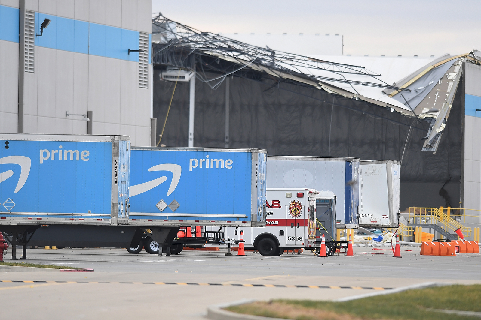 Amazon truck cabs are seen outside a damaged Amazon Distribution Center on December 11, in Edwardsville, Illinois. (Michael B. Thomas/Getty Images)
