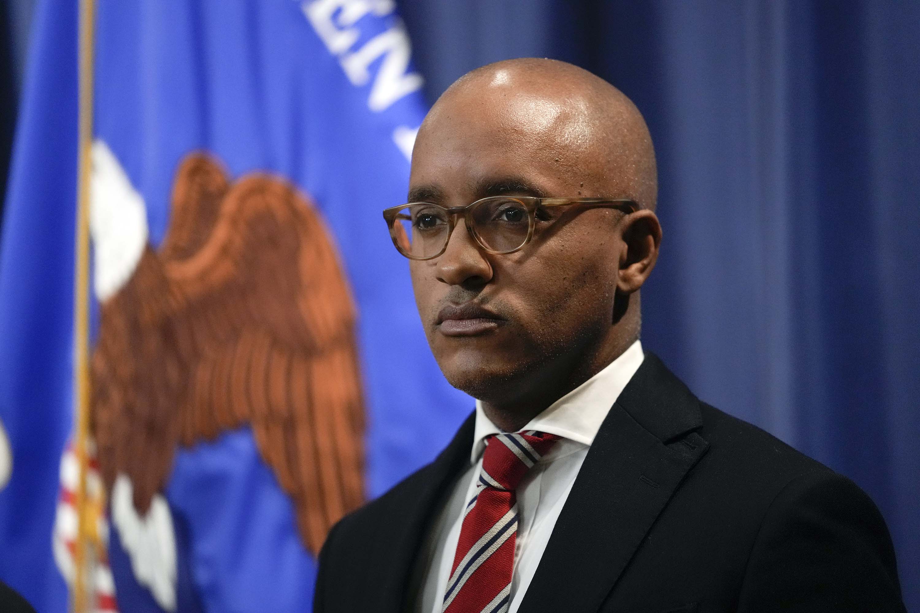US Attorney Damian Williams, for the Southern District of New York, listens during a news conference at the Department of Justice in Washington, on January 27.