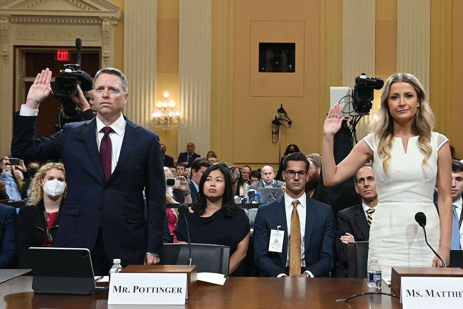 Matthew Pottinger and Sarah Matthews are sworn in during a hearing by the House select committee on Thursday evening.