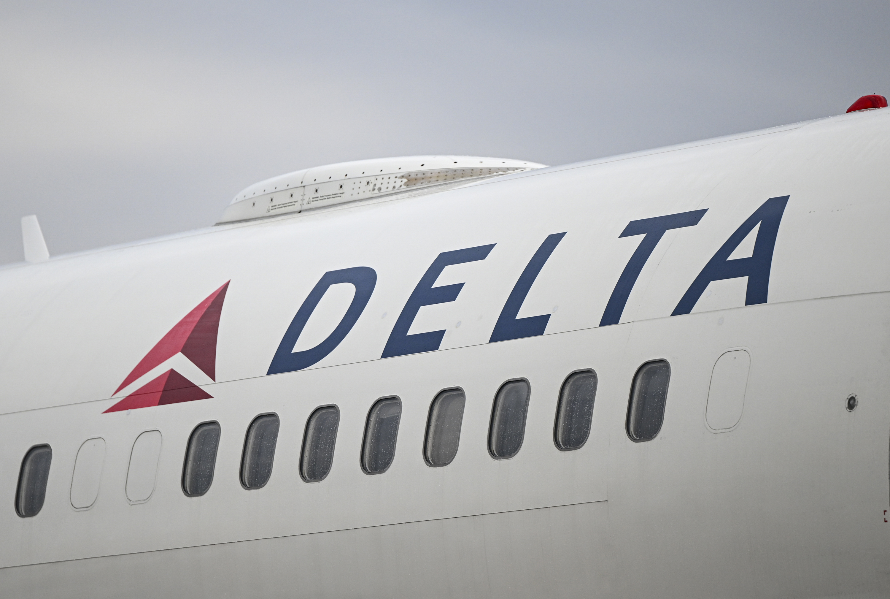 A Delta Airlines logo is seen on a passenger plane, in Washington DC, on February 16.