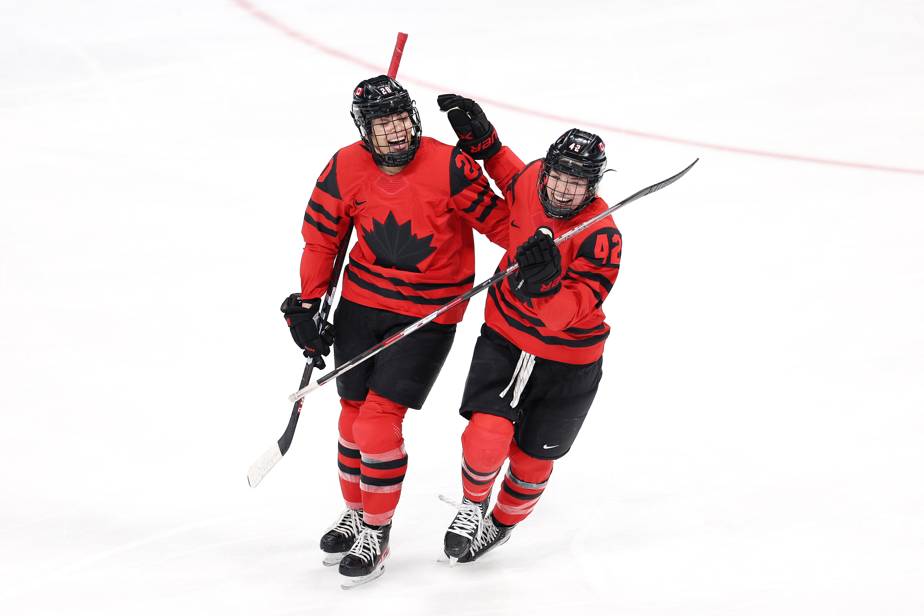 Team Canada's Sarah Nurse #20 celebrates with Claire Thompson #42 after scoring a goal in the first period during the women's ice hockey gold medal match between Team Canada and Team USA on Thursday.