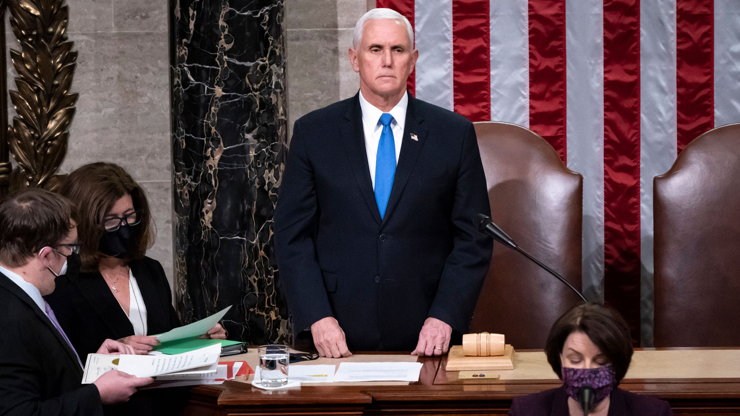 Vice President Mike Pence returns to the House chamber after the January 6 riot at the Capitol.