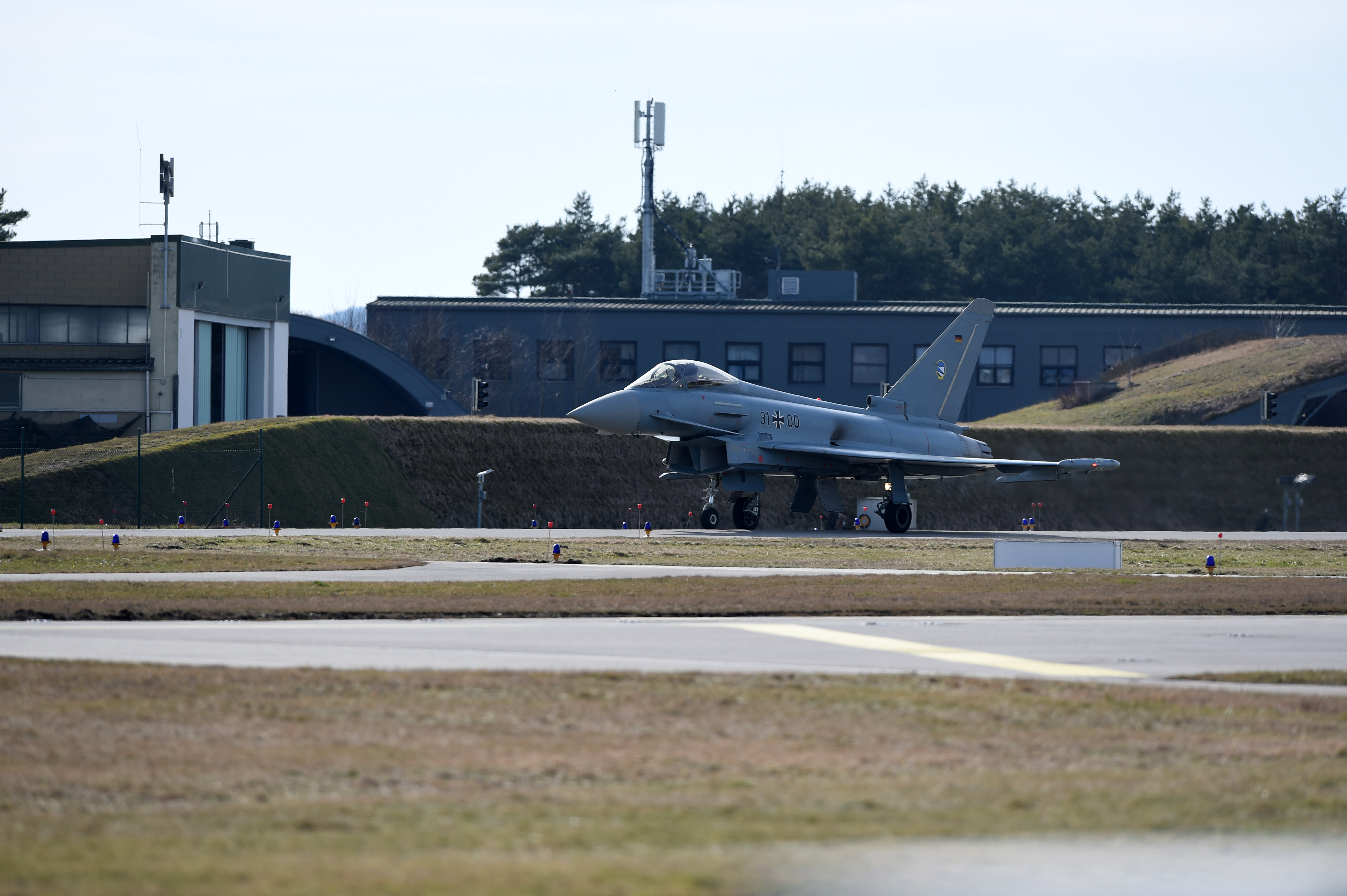 A Eurofighter stands at the air base in Neuburg an der Donau, Germany on February 24. In response to the growing tensions, the Bundeswehr is preparing to transfer more Eurofighters to Romania to protect NATO's southeastern flank. 